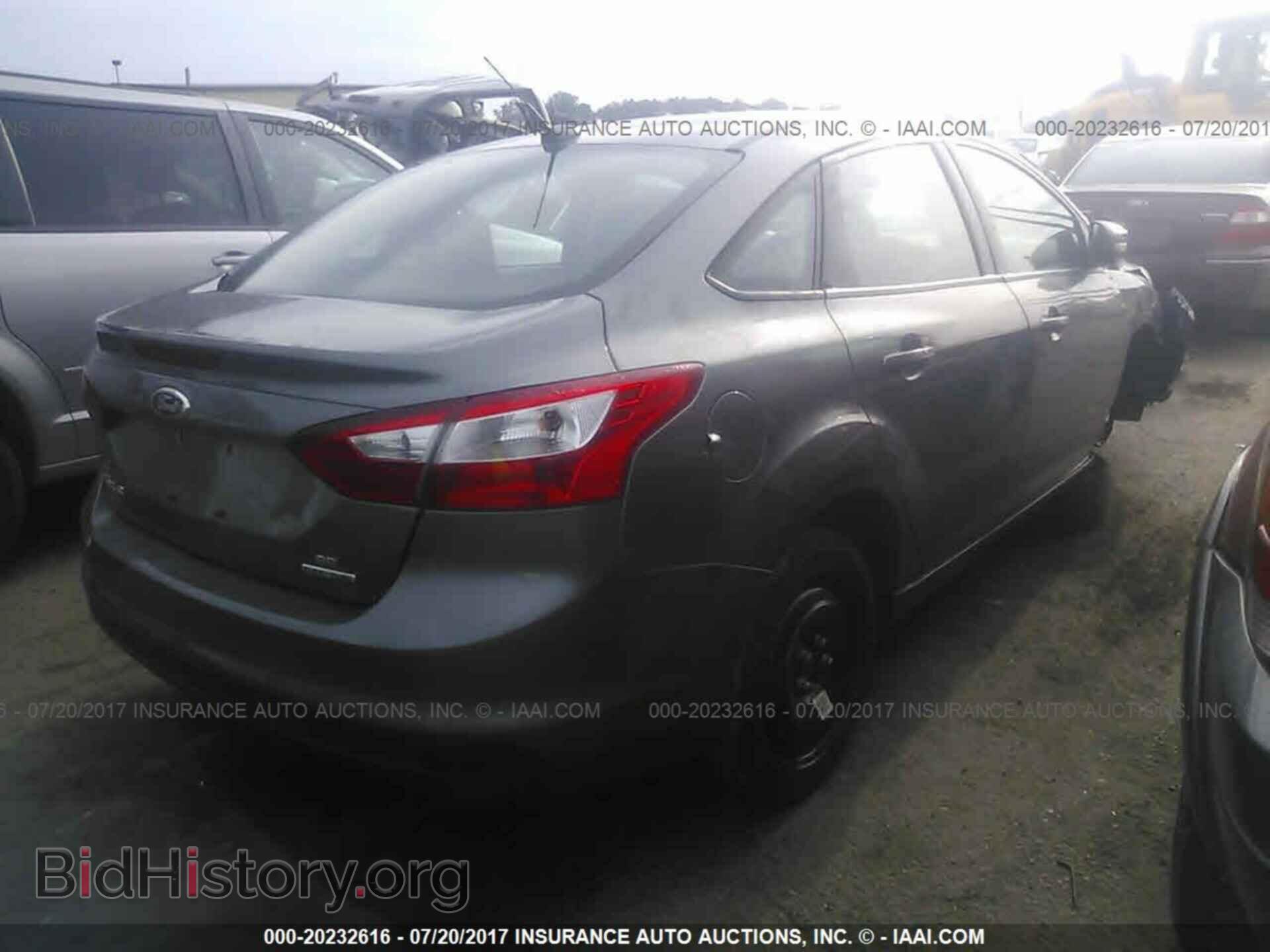 2014 Ford Focus - VIN: 1FADP3F29EL310828 - Photo 4