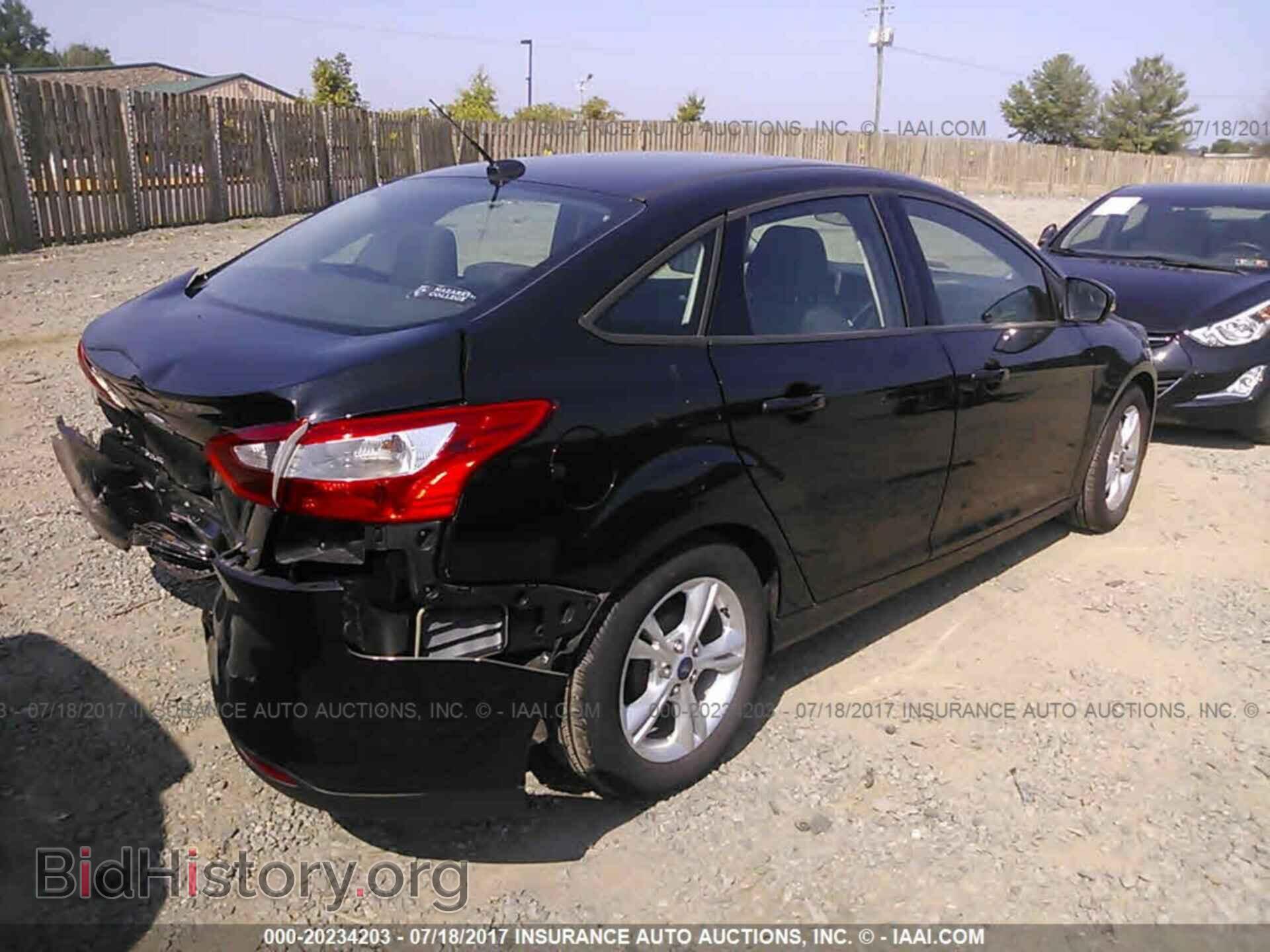 2014 Ford Focus - VIN: 1FADP3F2XEL370116 - Photo 4