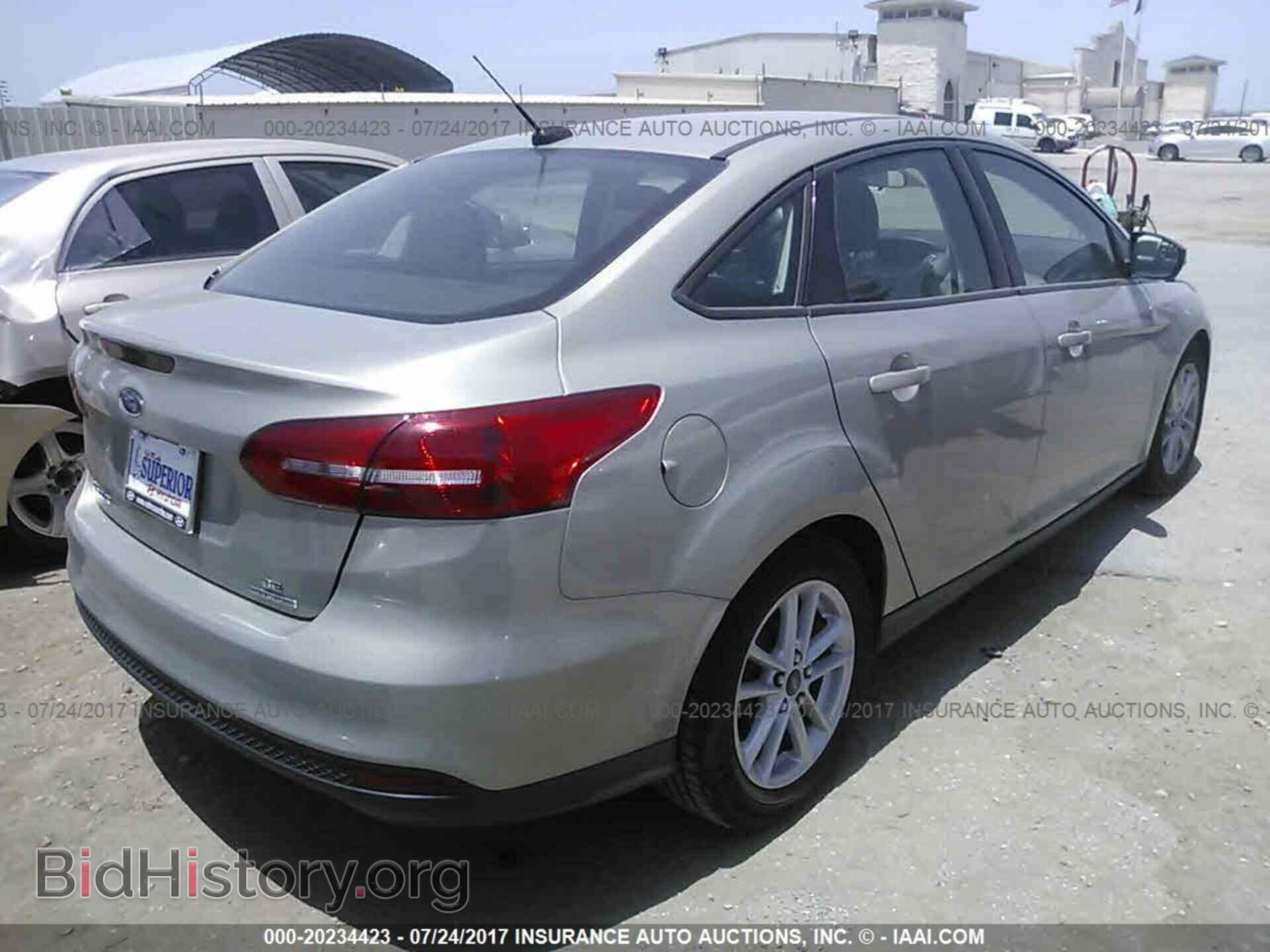 2015 Ford Focus - VIN: 1FADP3F20FL335229 - Photo 4