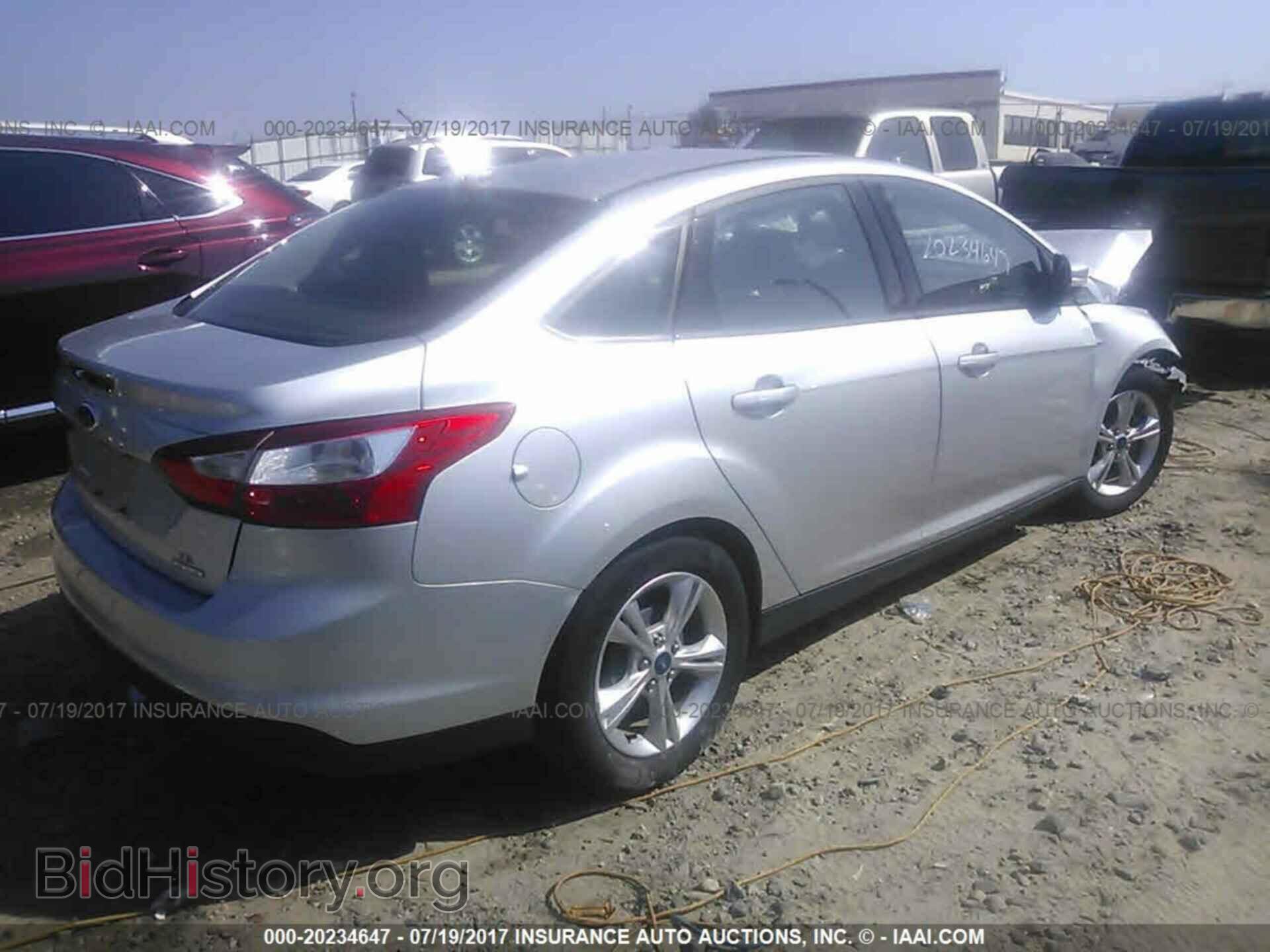 2014 Ford Focus - VIN: 1FADP3F24EL367521 - Photo 4