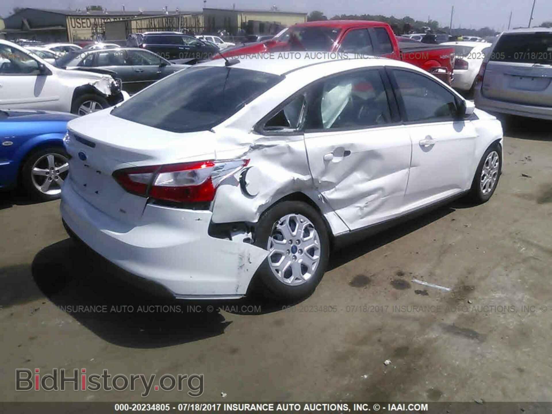2012 Ford Focus - VIN: 1FAHP3F26CL311630 - Photo 4