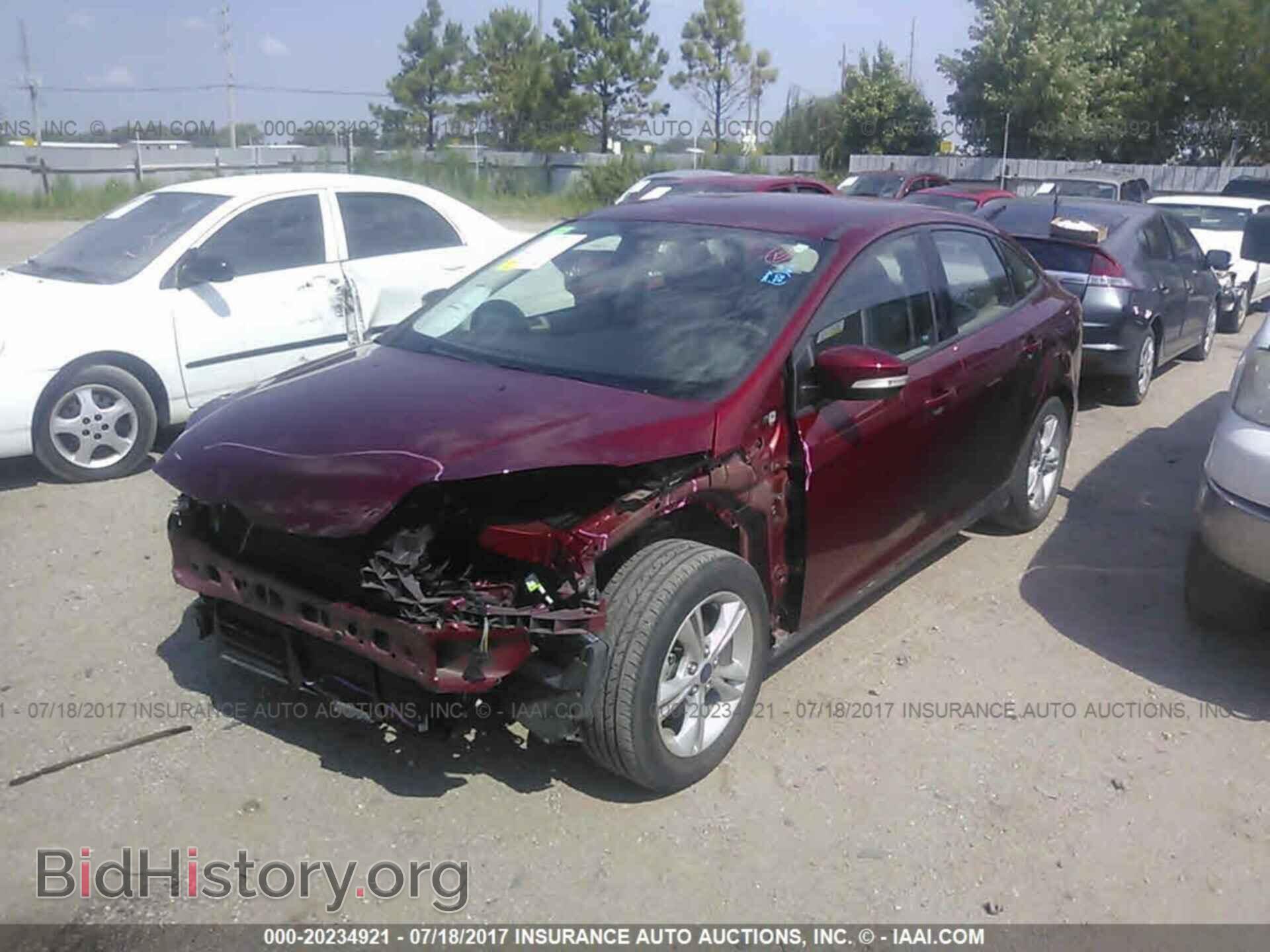 2014 Ford Focus - VIN: 1FADP3F24EL412957 - Фото 2
