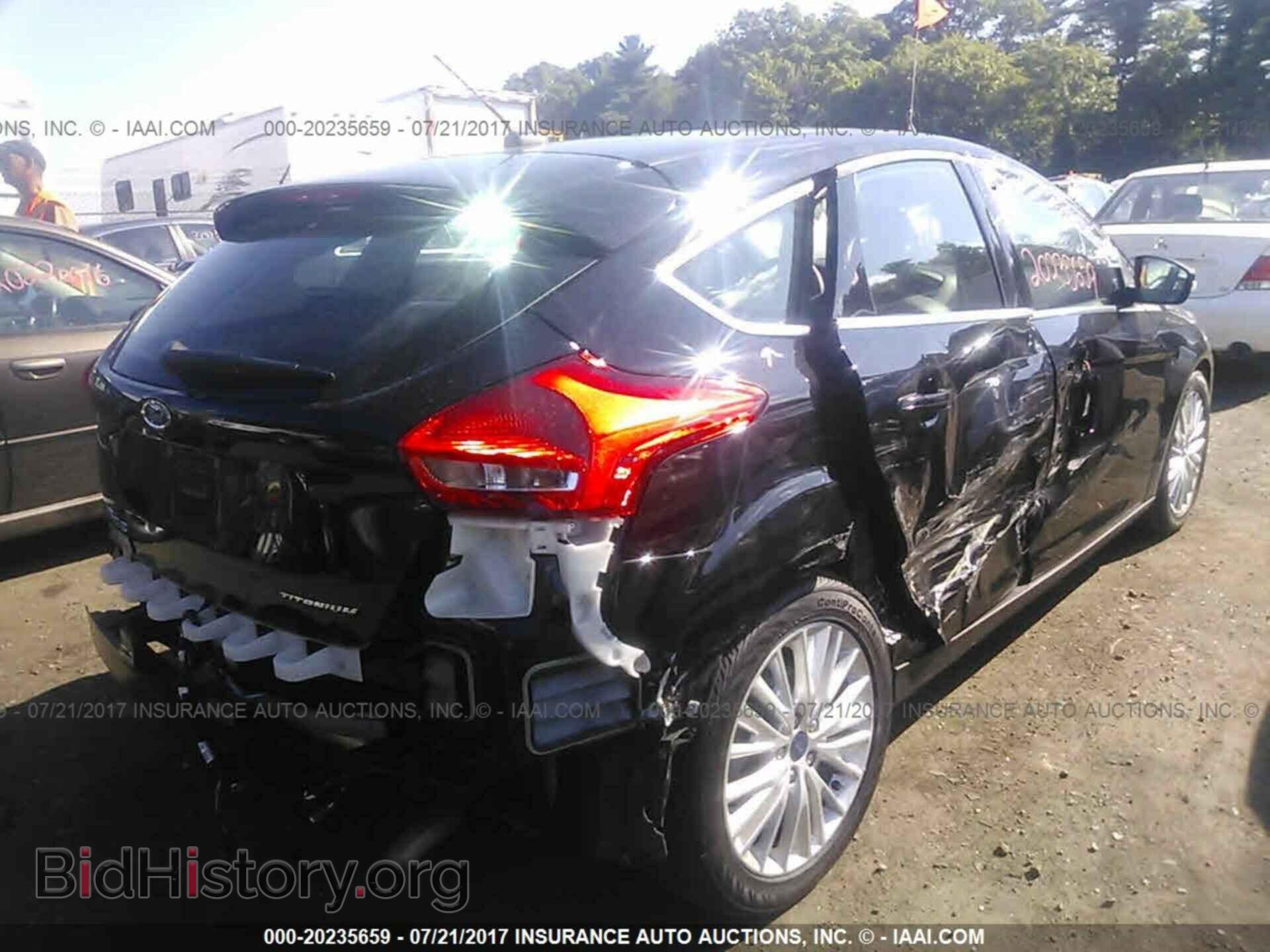 2016 Ford Focus - VIN: 1FADP3N26GL303890 - Фото 4