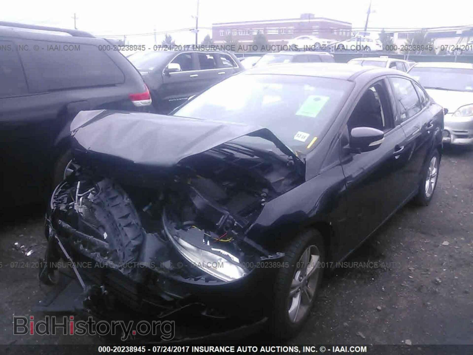 2014 Ford Focus - VIN: 1FADP3F20EL178798 - Photo 2