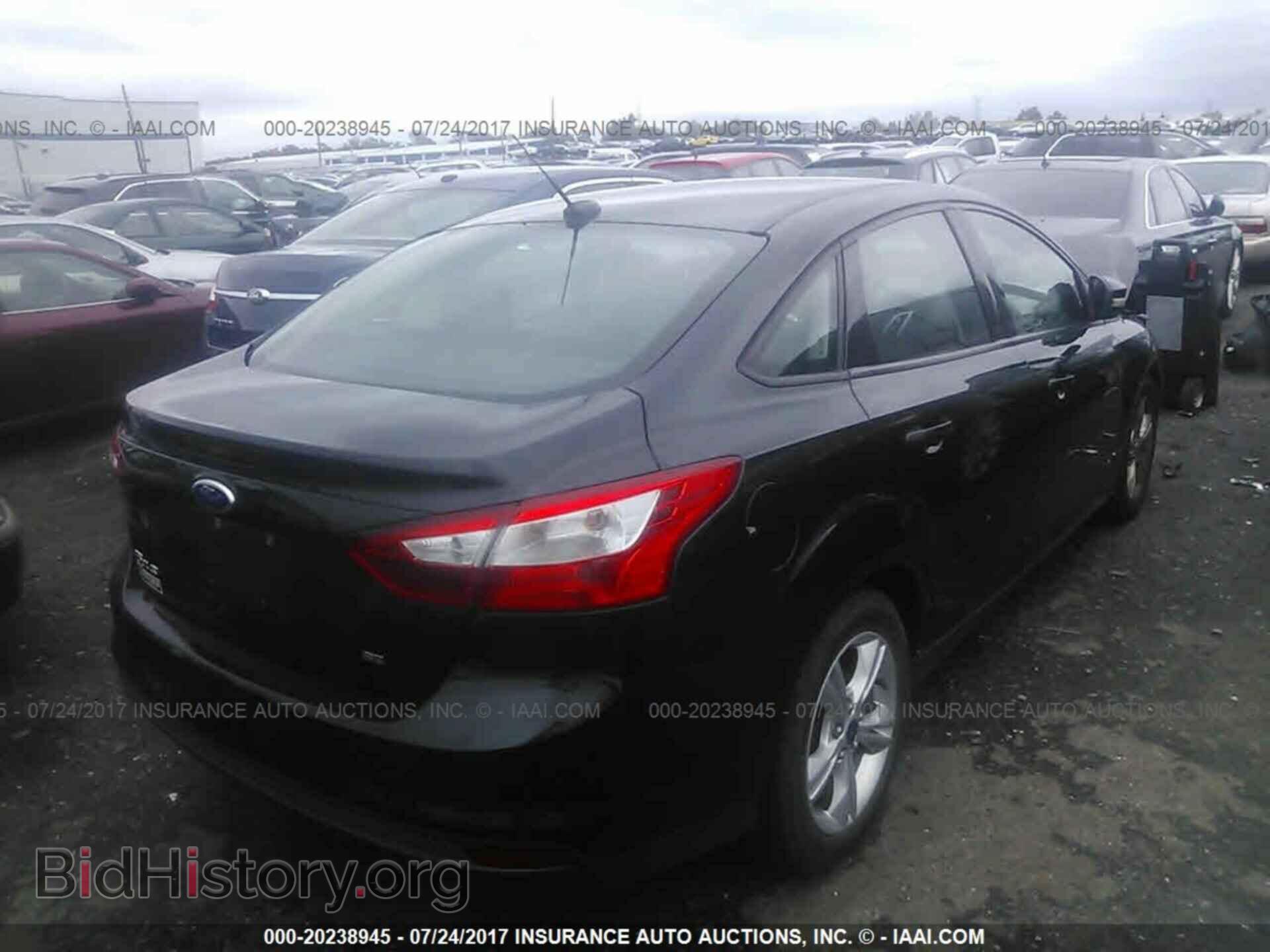 2014 Ford Focus - VIN: 1FADP3F20EL178798 - Photo 4