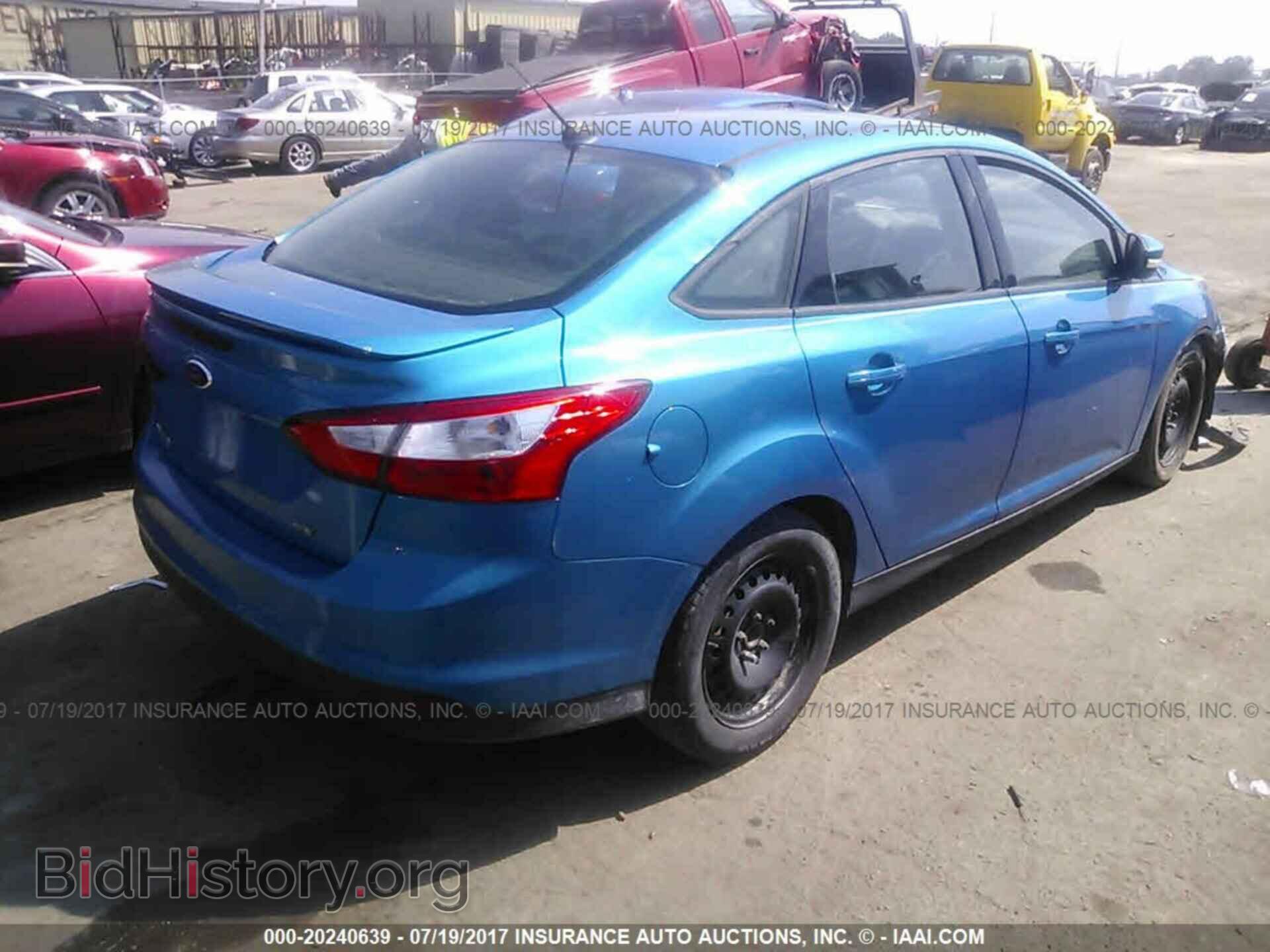 2012 Ford Focus - VIN: 1FAHP3F22CL319935 - Photo 4