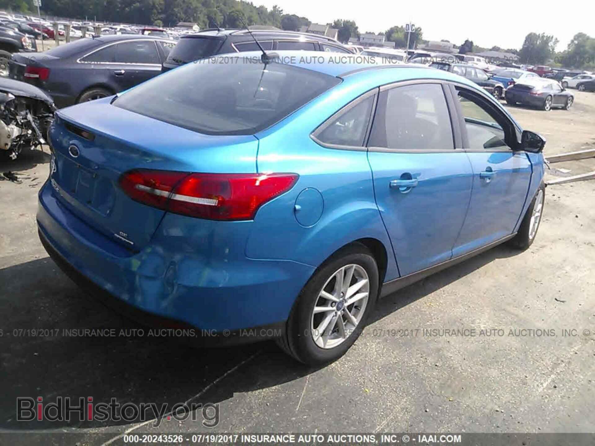 2016 Ford Focus - VIN: 1FADP3F24GL403100 - Photo 4