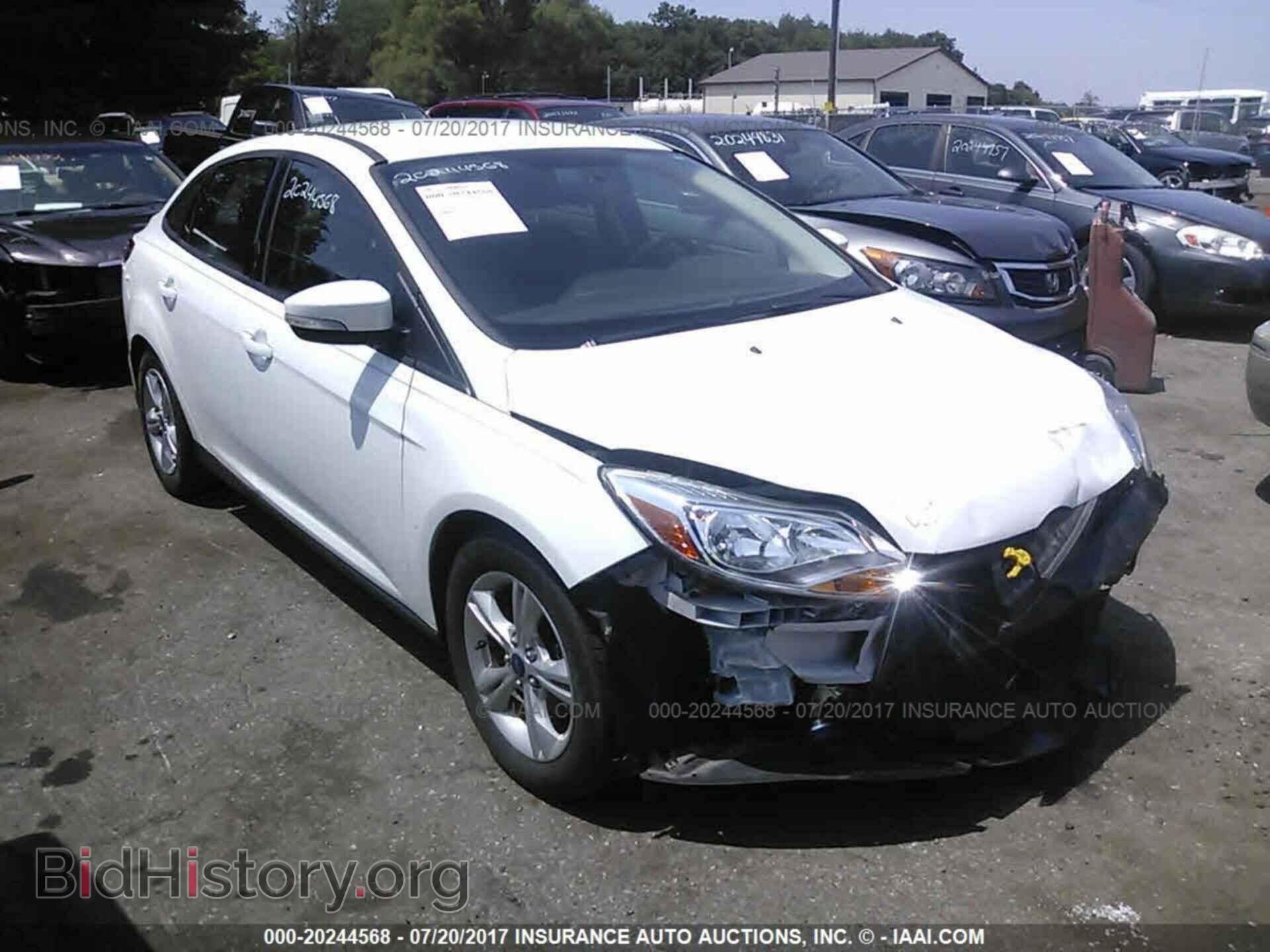 Photo 1FADP3F29EL346504 - Ford Focus 2014