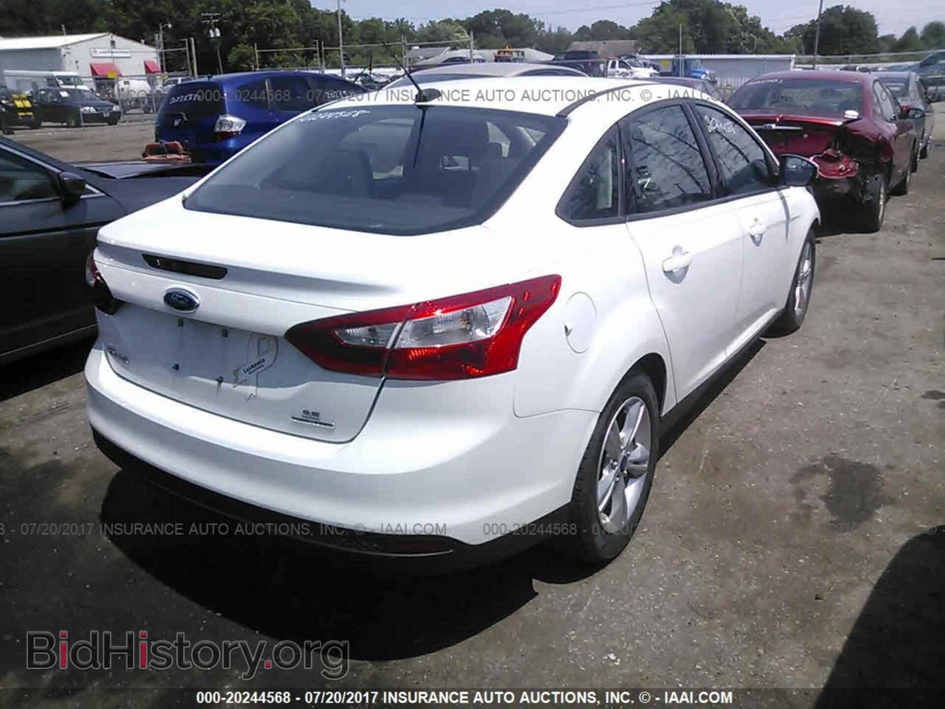 2014 Ford Focus - VIN: 1FADP3F29EL346504 - Фото 4