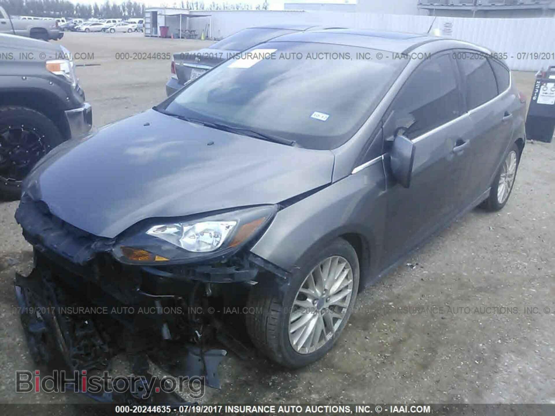 2014 Ford Focus - VIN: 1FADP3N25EL381140 - Фото 2