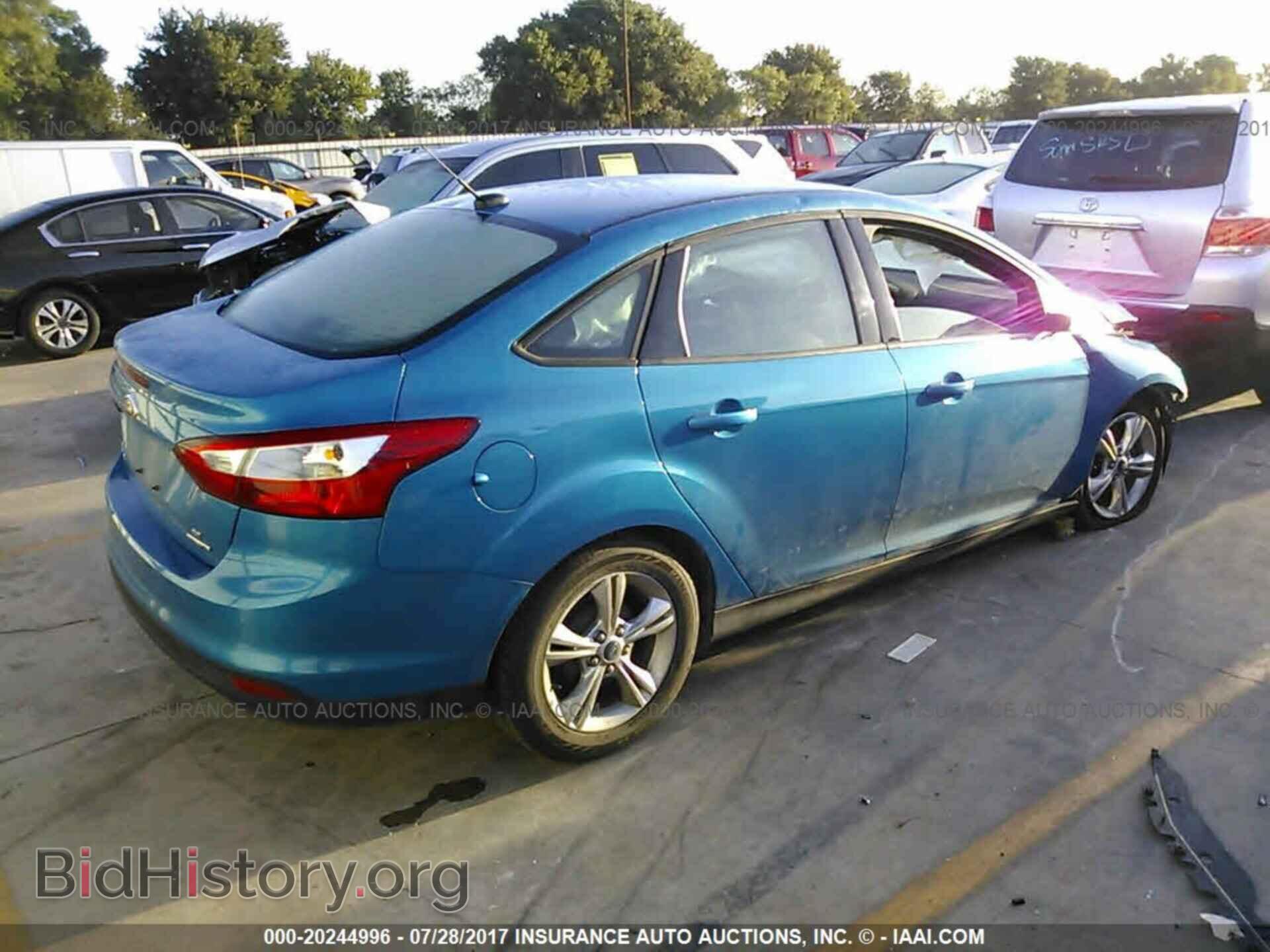2013 Ford Focus - VIN: 1FADP3F22DL183841 - Фото 4