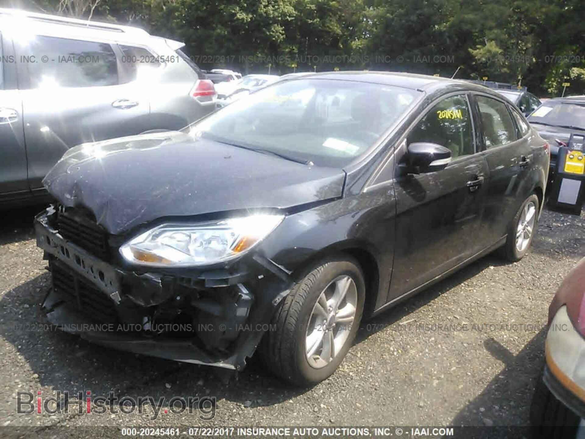 2014 Ford Focus - VIN: 1FADP3F25EL424471 - Фото 2