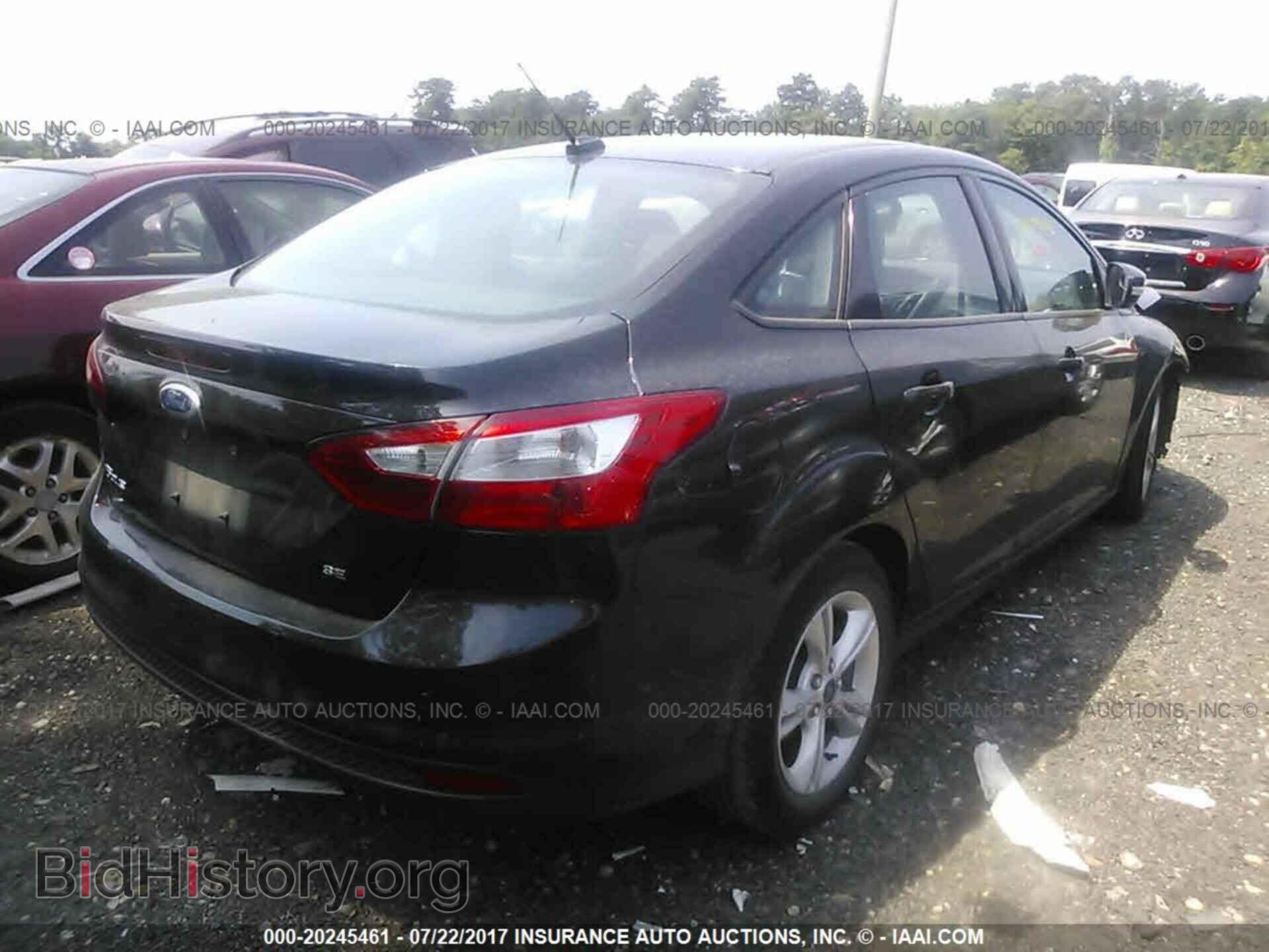 2014 Ford Focus - VIN: 1FADP3F25EL424471 - Фото 4