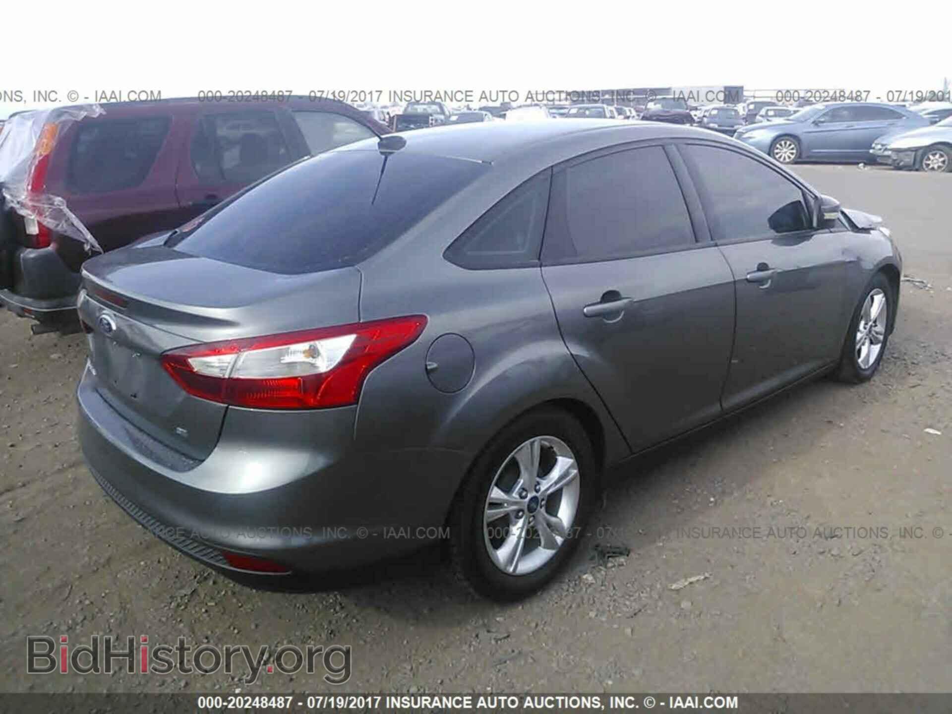 2014 Ford Focus - VIN: 1FADP3F22EL162537 - Photo 4
