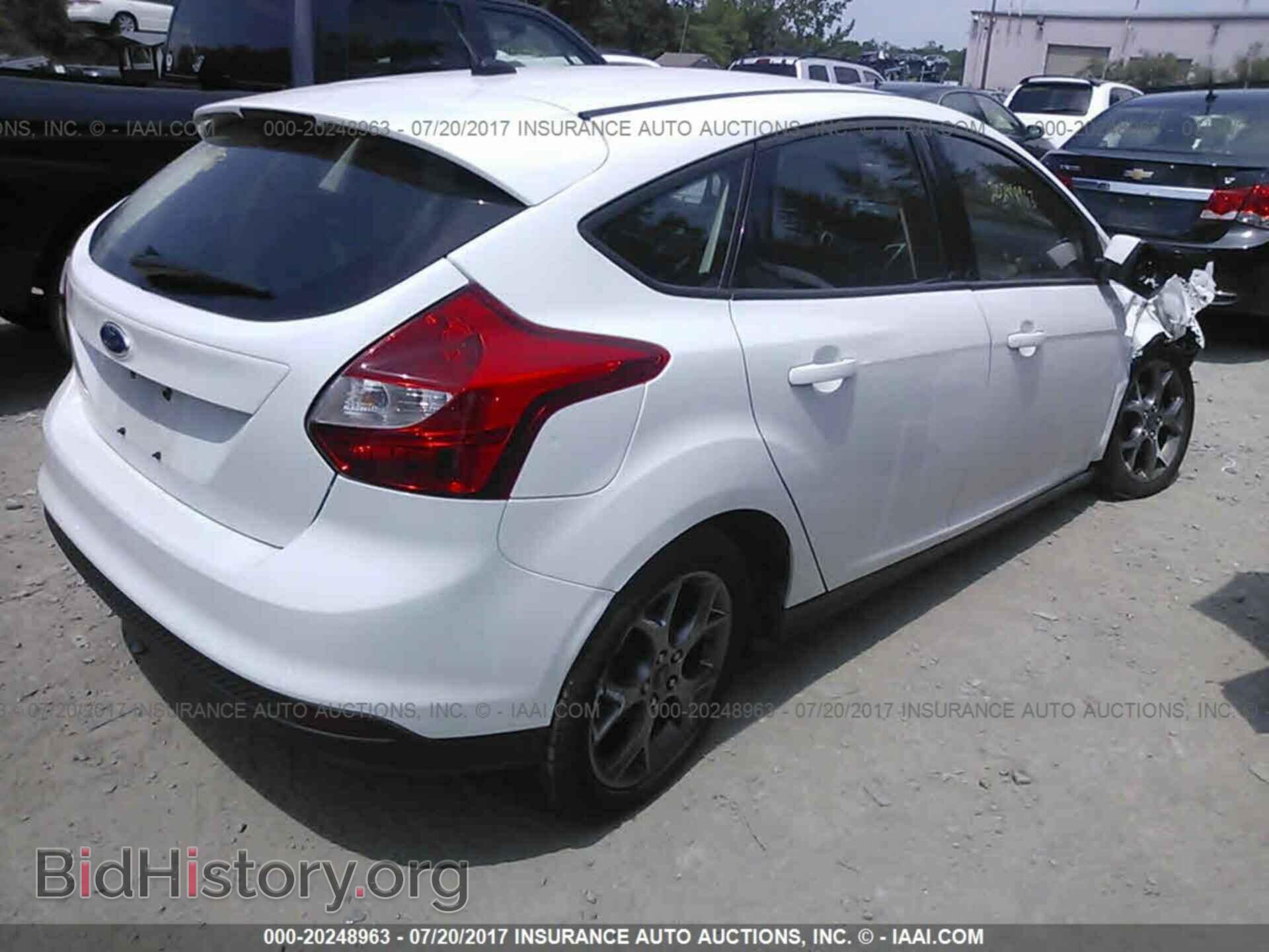 2014 Ford Focus - VIN: 1FADP3K29EL462923 - Фото 4