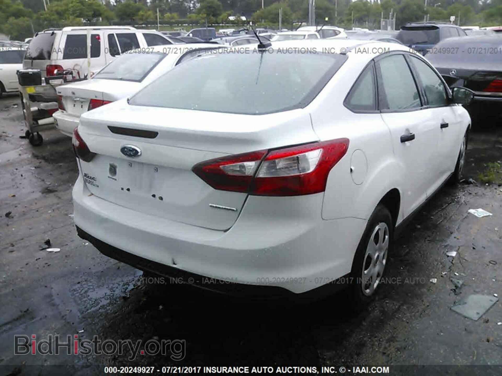 2014 Ford Focus - VIN: 1FADP3E21EL153233 - Photo 4