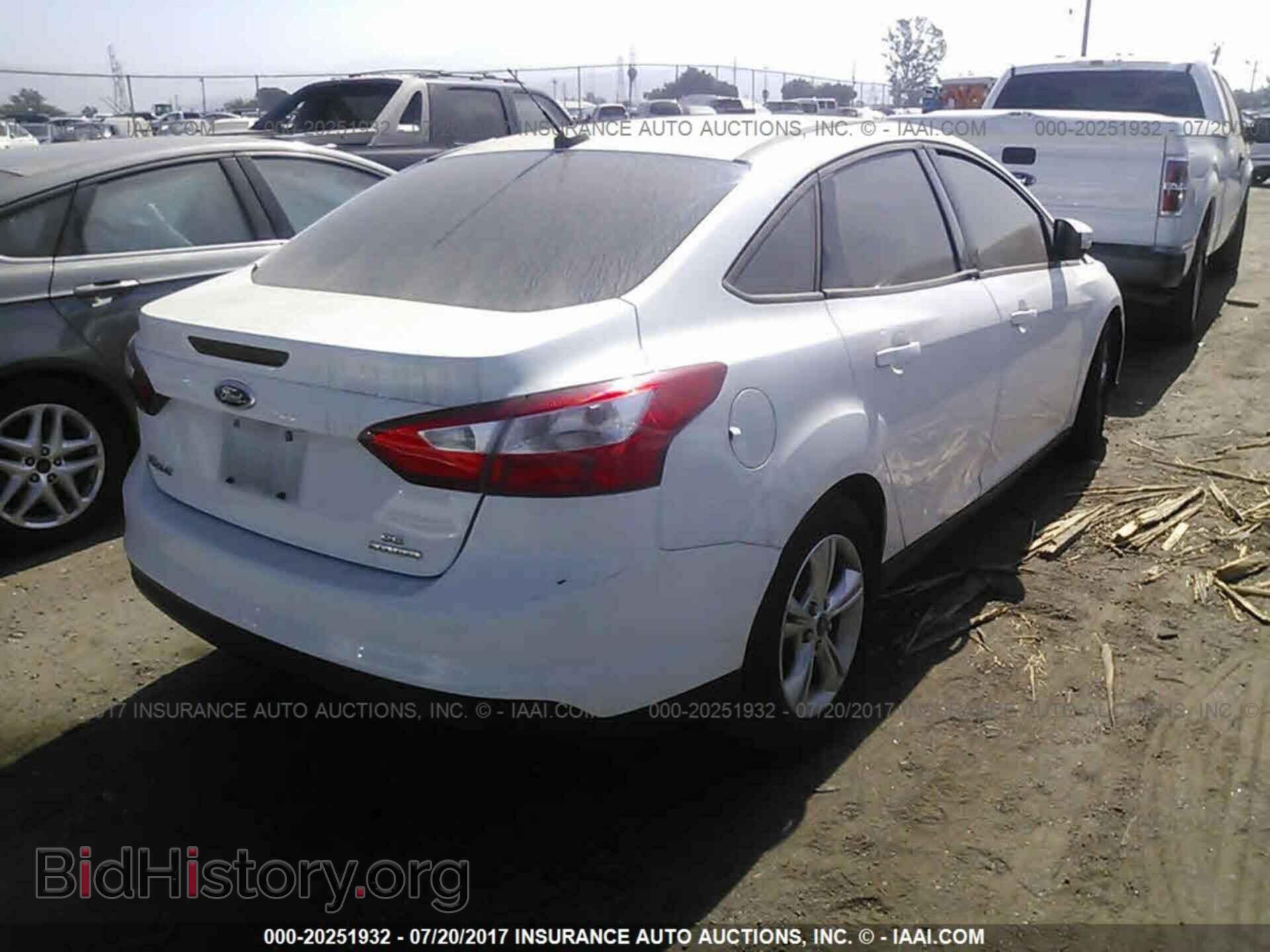 2013 Ford Focus - VIN: 1FADP3F20DL213077 - Photo 4
