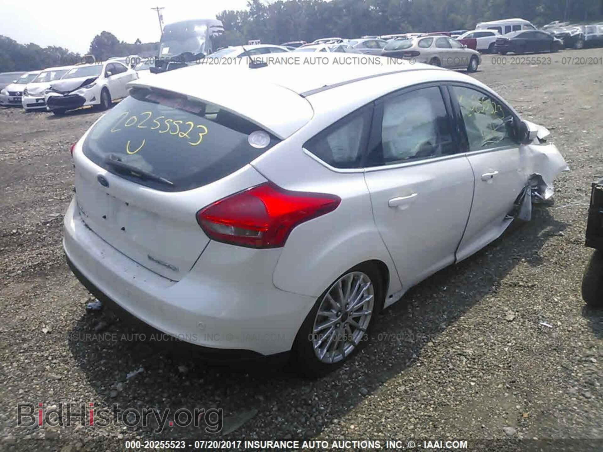 2015 Ford Focus - VIN: 1FADP3R40FL304852 - Photo 4