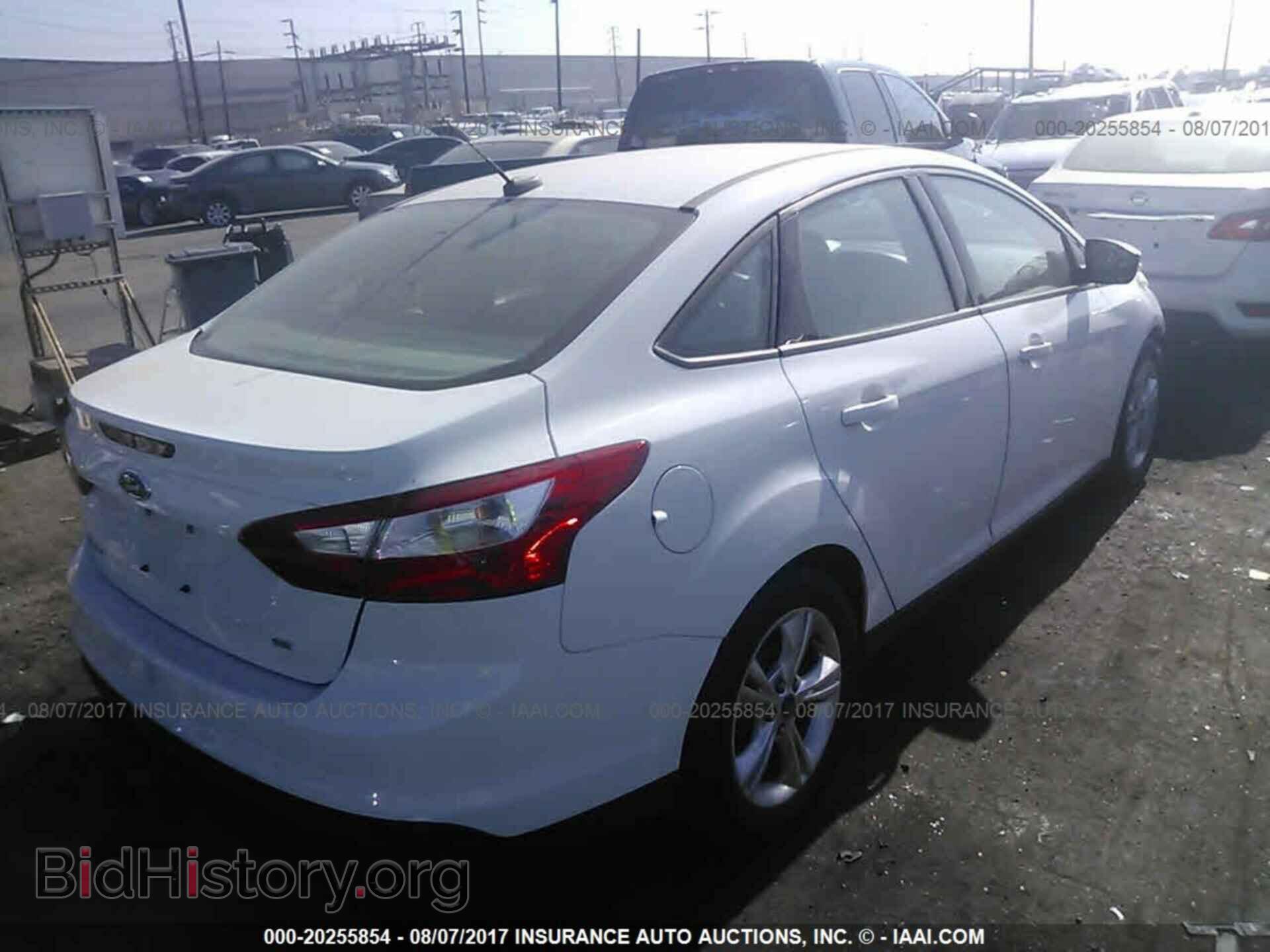 2014 Ford Focus - VIN: 1FADP3F2XEL156405 - Photo 4