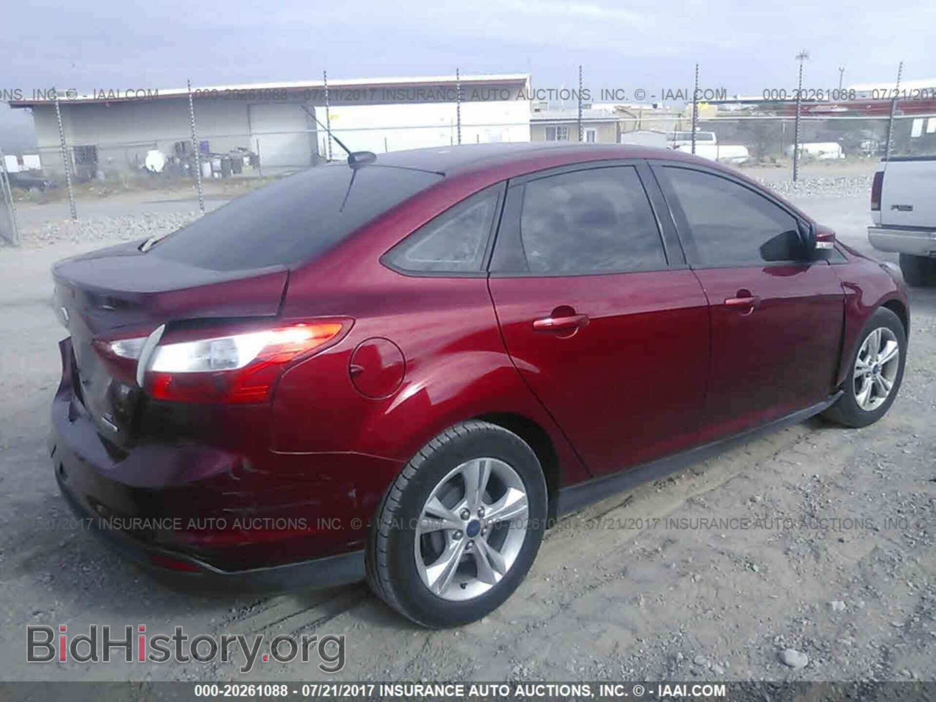 2014 Ford Focus - VIN: 1FADP3F29EL372696 - Photo 4