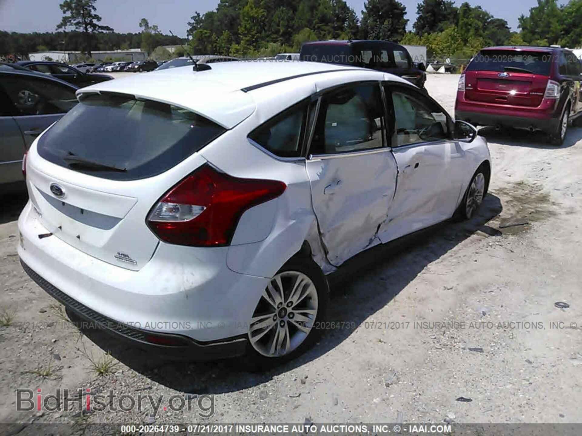 2012 Ford Focus - VIN: 1FAHP3M25CL410944 - Photo 4