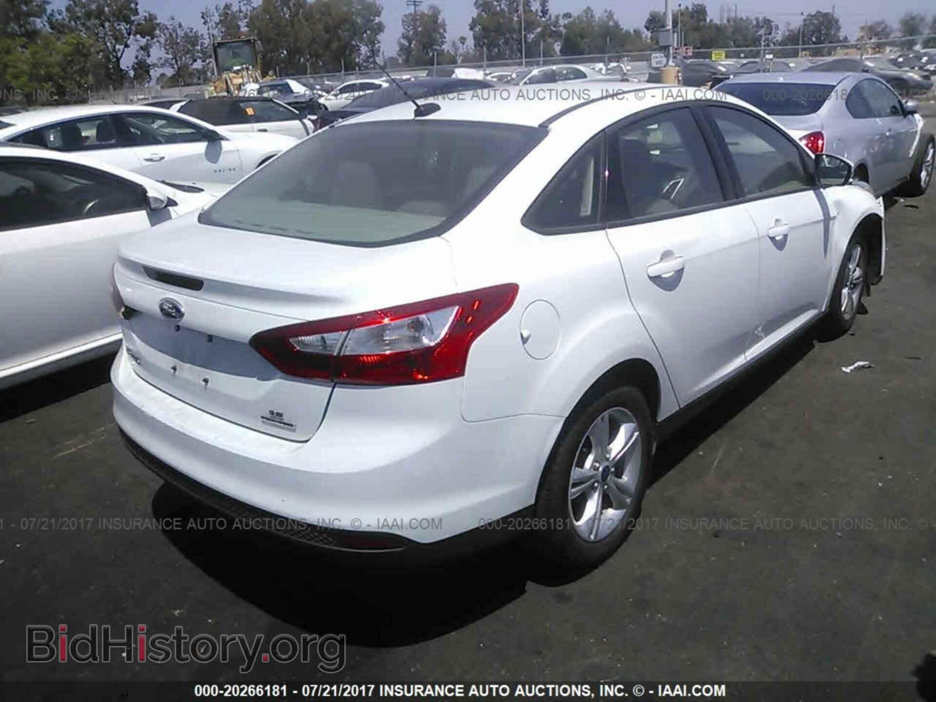 2013 Ford Focus - VIN: 1FADP3F22DL204073 - Photo 4