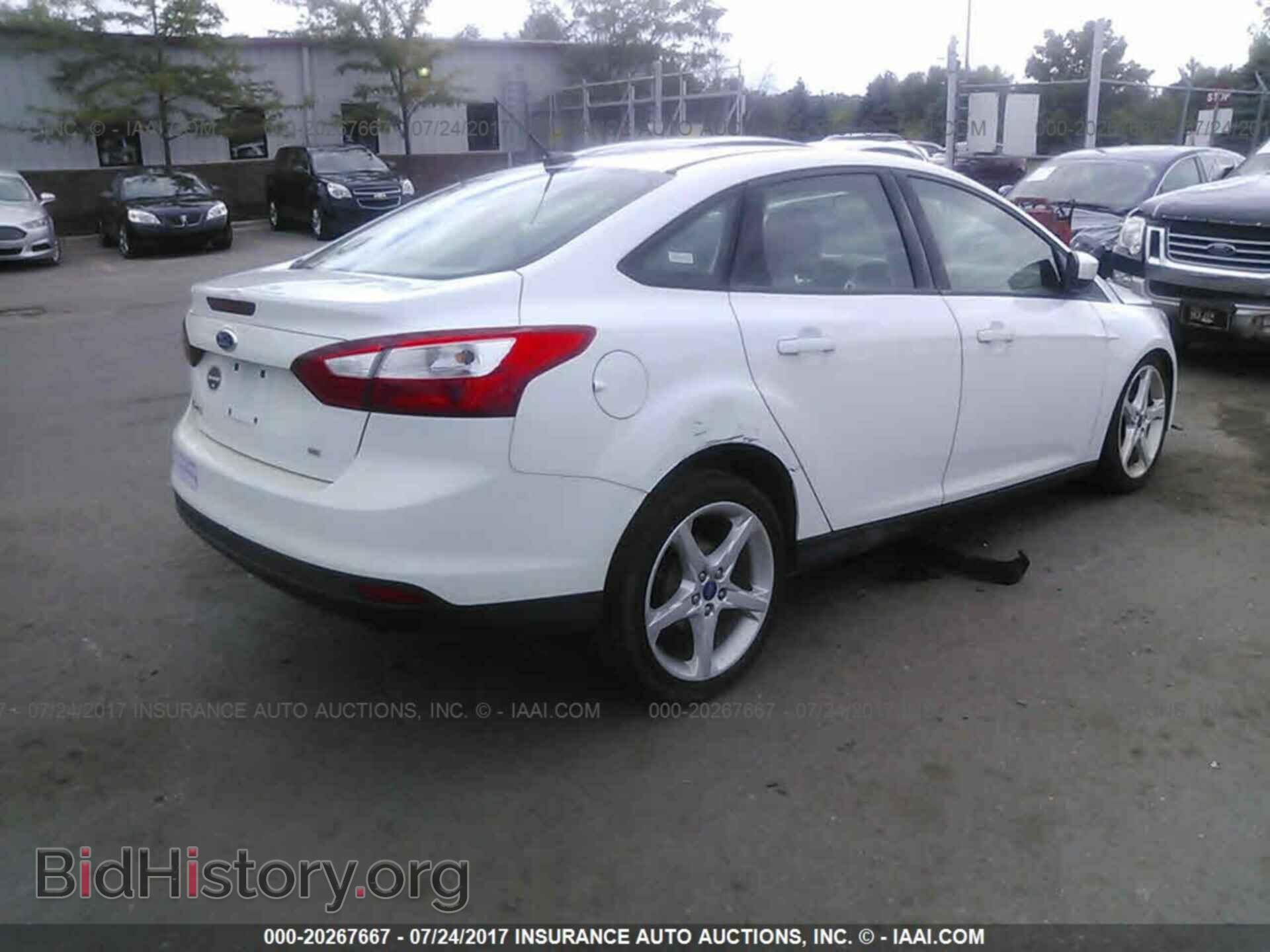 2012 Ford Focus - VIN: 1FAHP3F29CL106061 - Photo 4