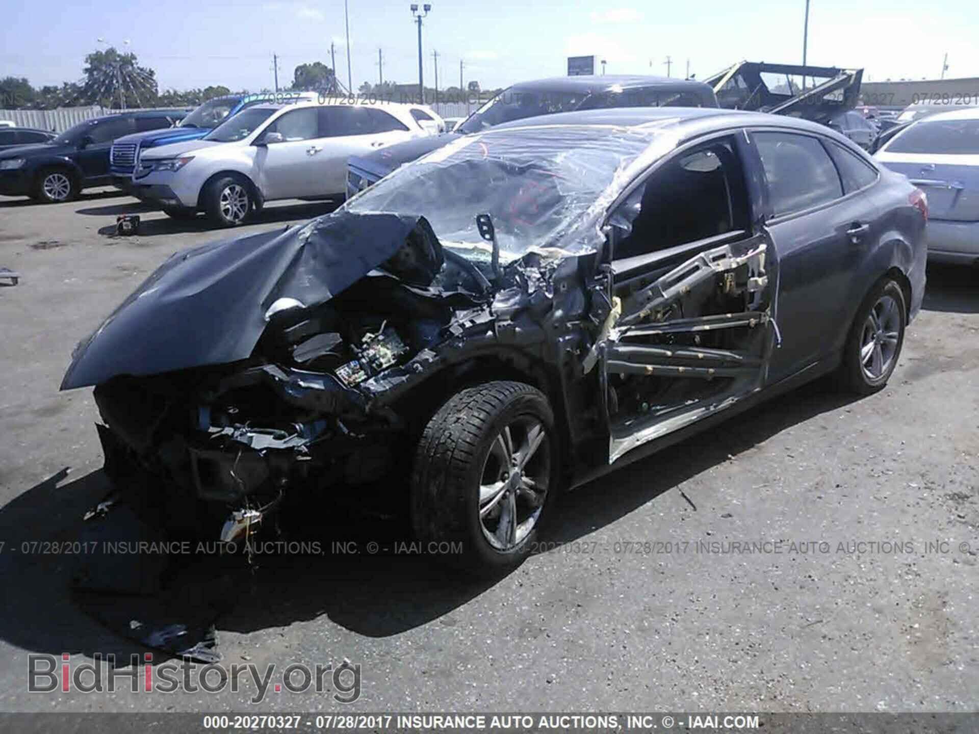 2013 Ford Focus - VIN: 1FADP3F20DL169940 - Фото 2