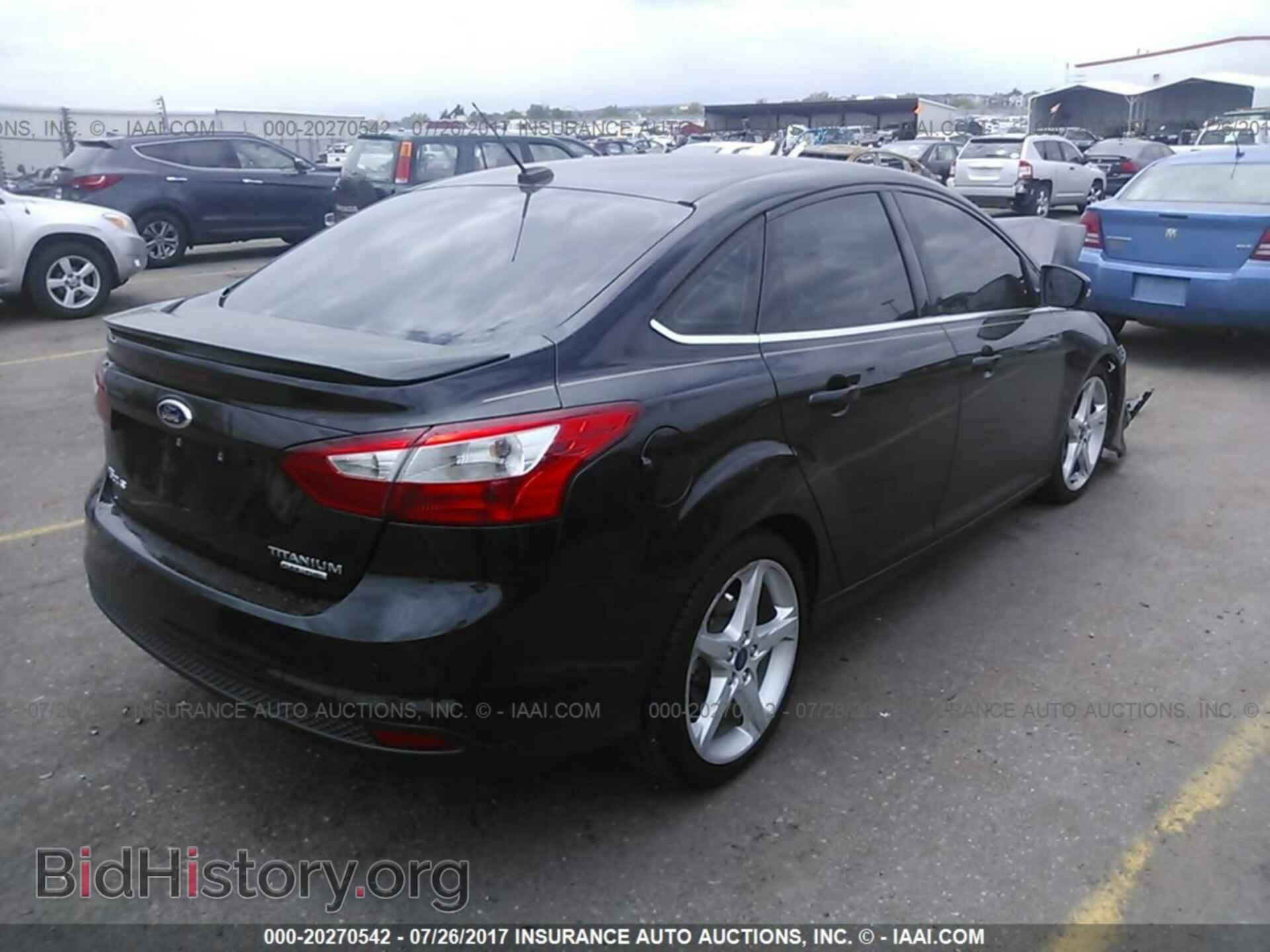 2014 Ford Focus - VIN: 1FADP3J25EL109905 - Фото 4