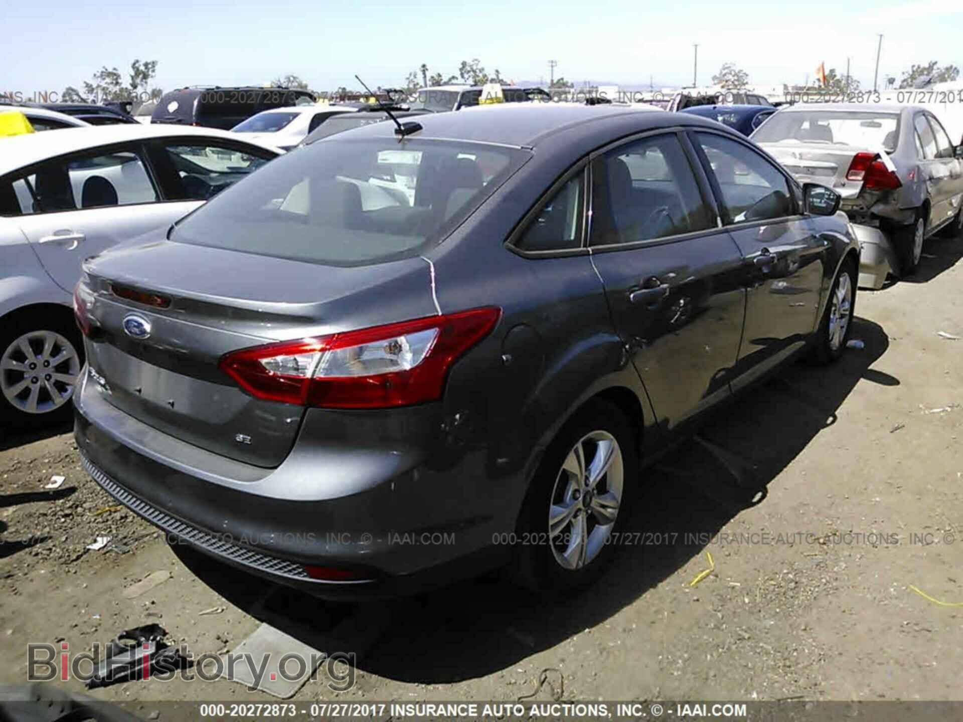 2014 Ford Focus - VIN: 1FADP3F21EL125317 - Photo 4