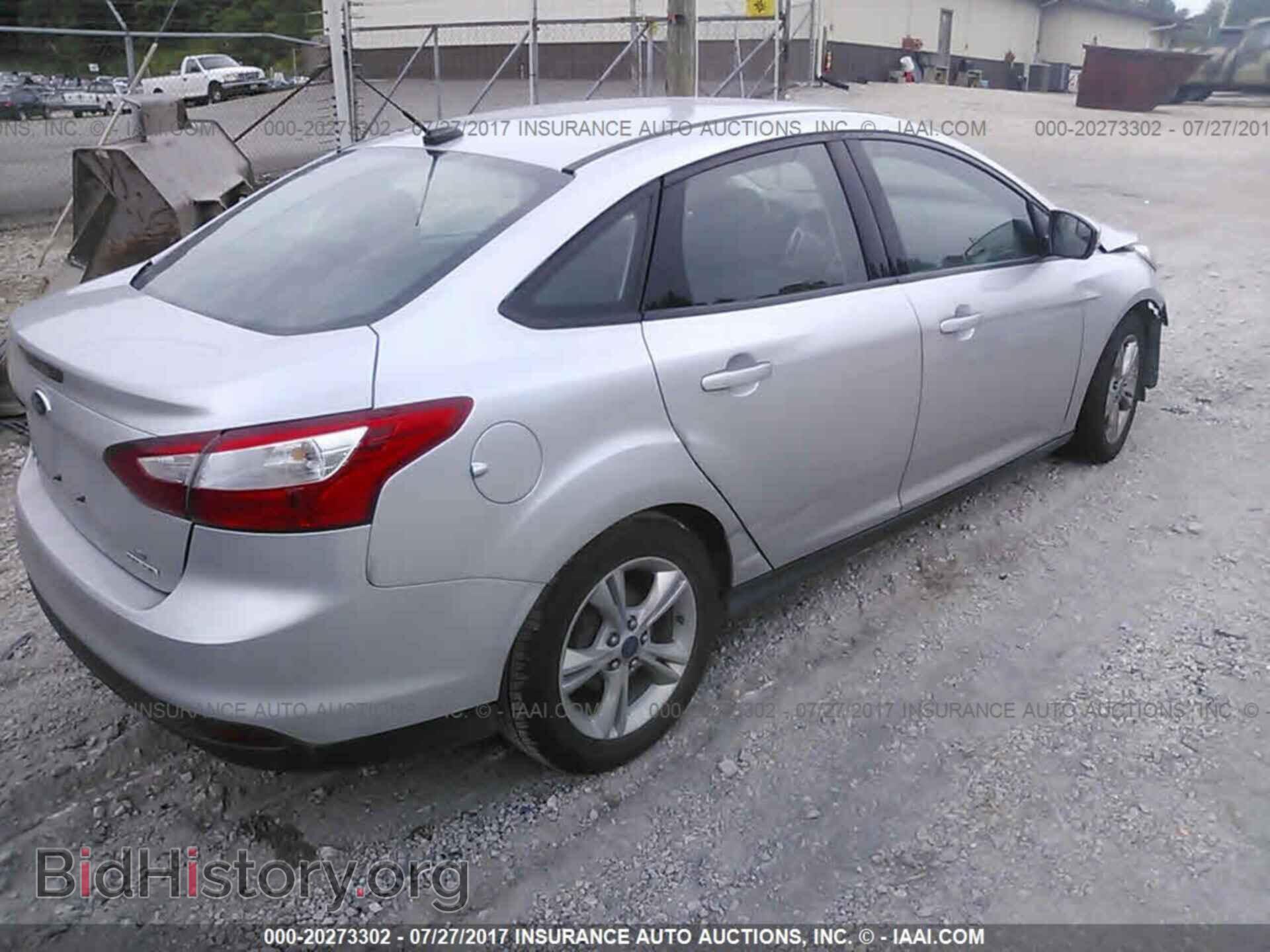 2014 Ford Focus - VIN: 1FADP3F24EL206702 - Фото 4