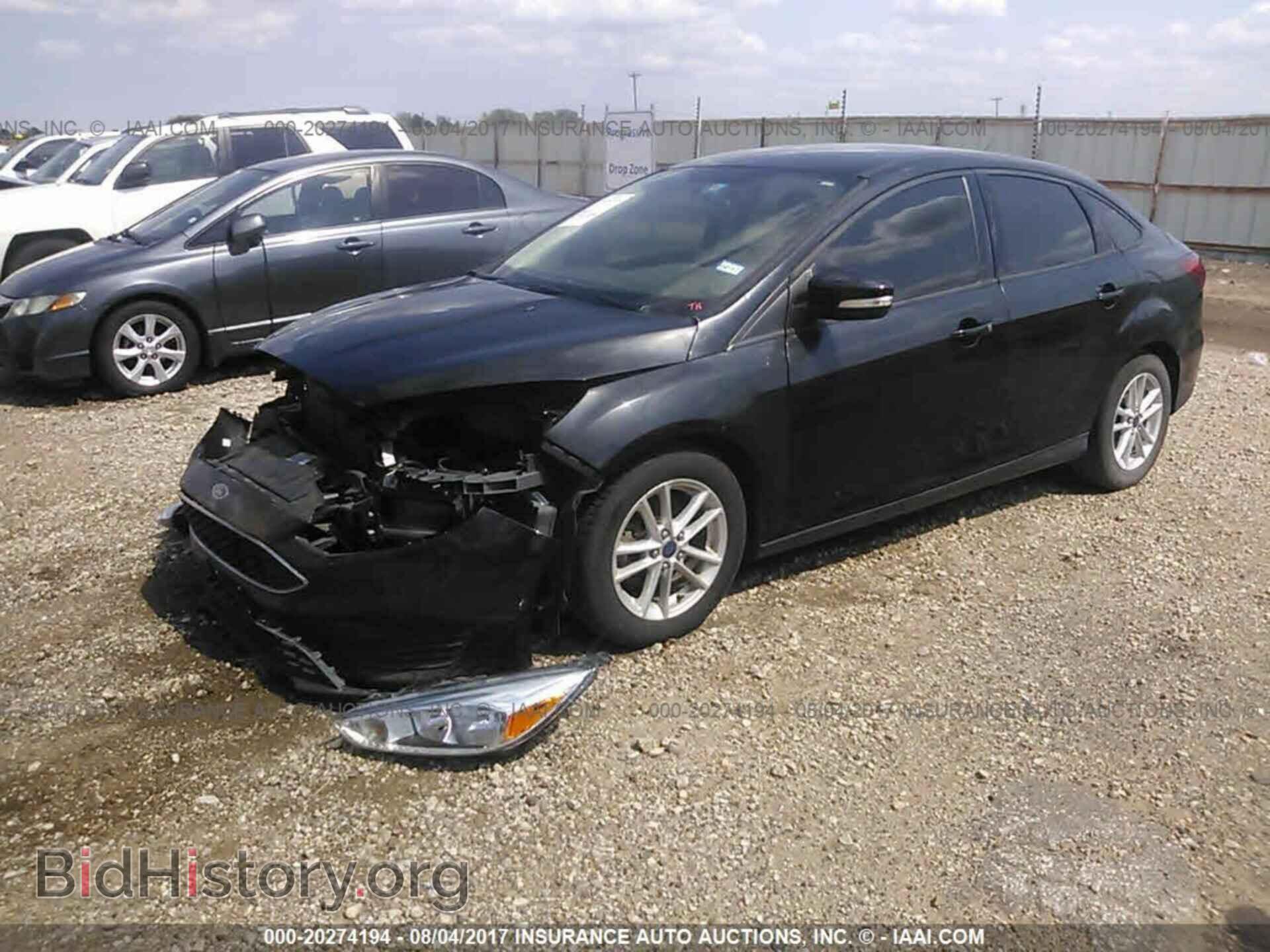 2015 Ford Focus - VIN: 1FADP3F27FL219686 - Photo 2