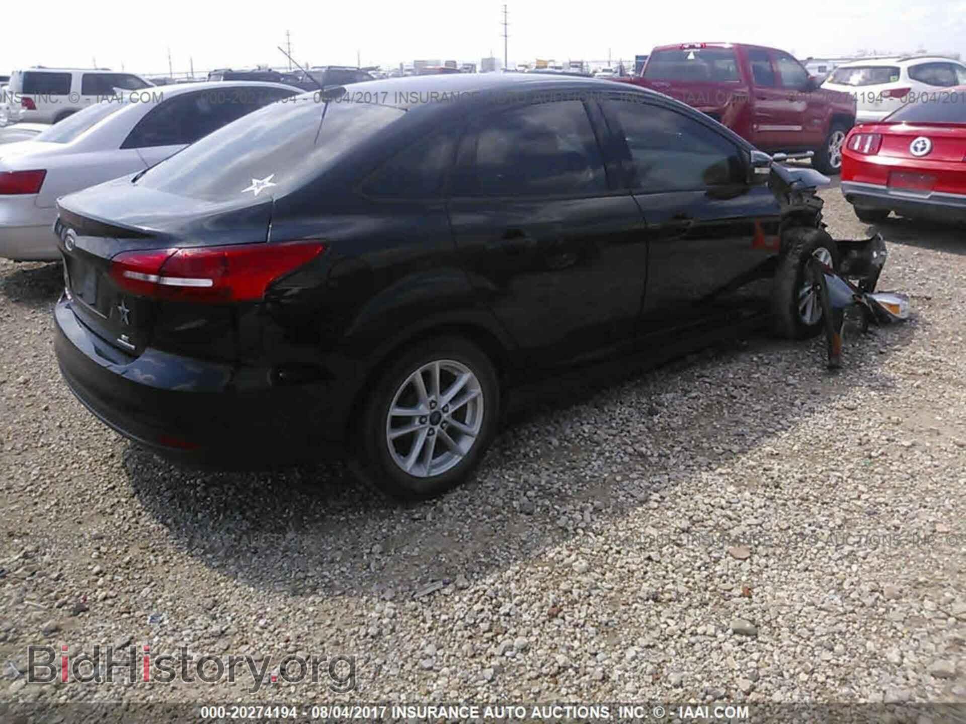 2015 Ford Focus - VIN: 1FADP3F27FL219686 - Photo 4
