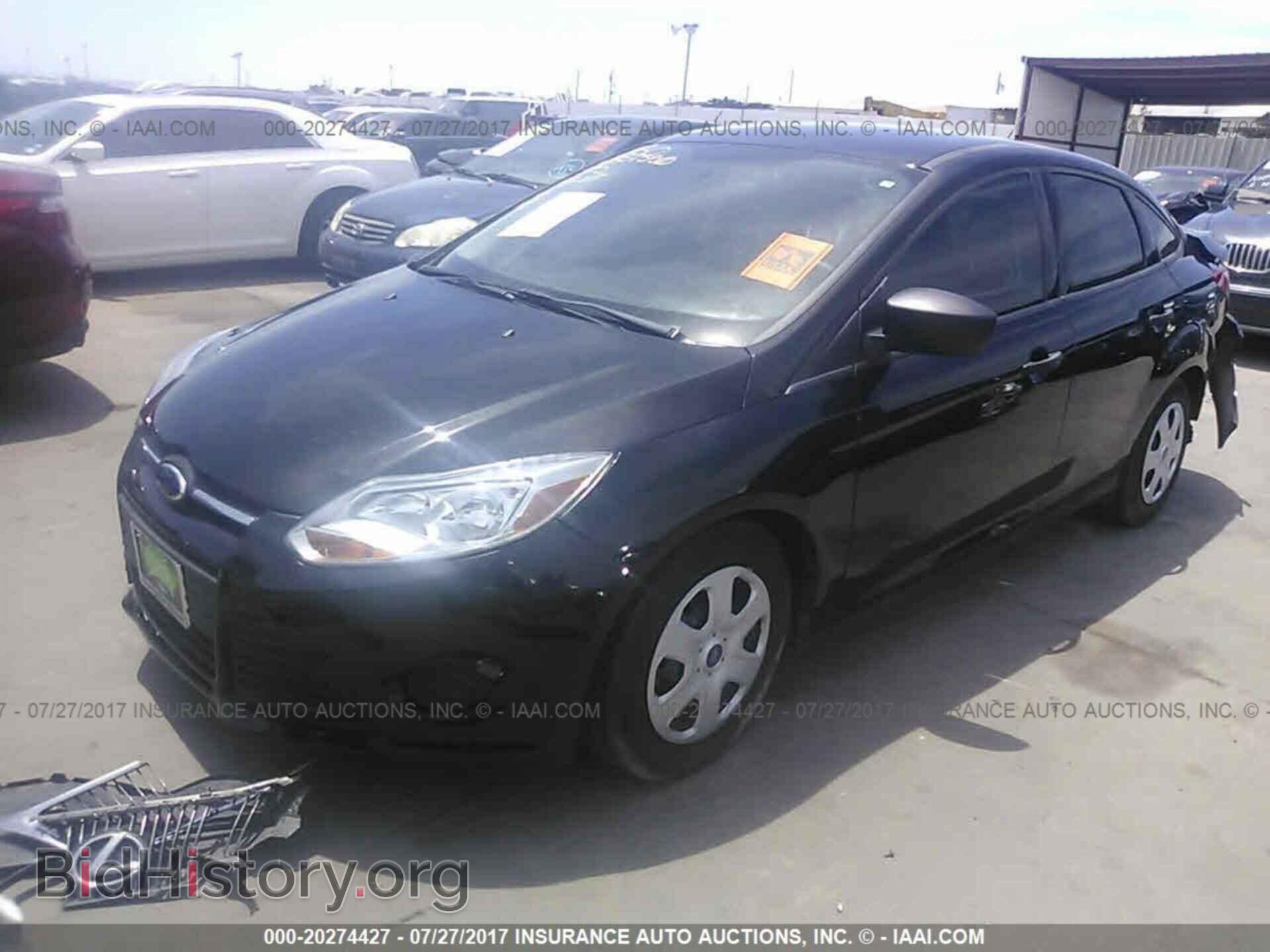 2014 Ford Focus - VIN: 1FADP3E2XEL419509 - Фото 2