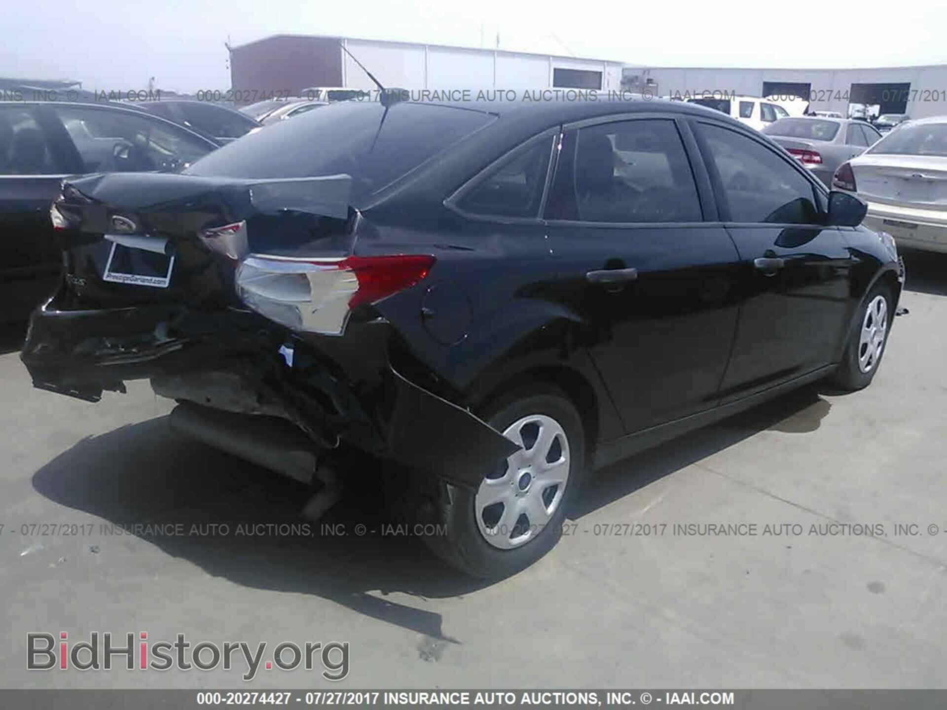 2014 Ford Focus - VIN: 1FADP3E2XEL419509 - Фото 4
