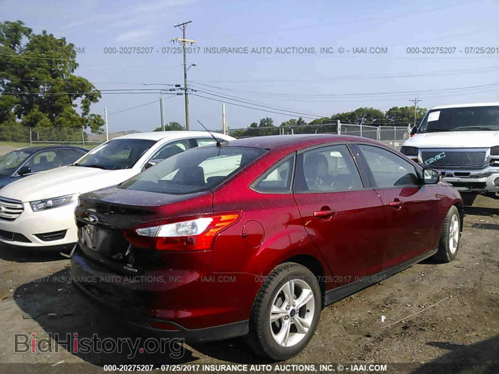 2014 Ford Focus - VIN: 1FADP3F26EL439299 - Photo 4