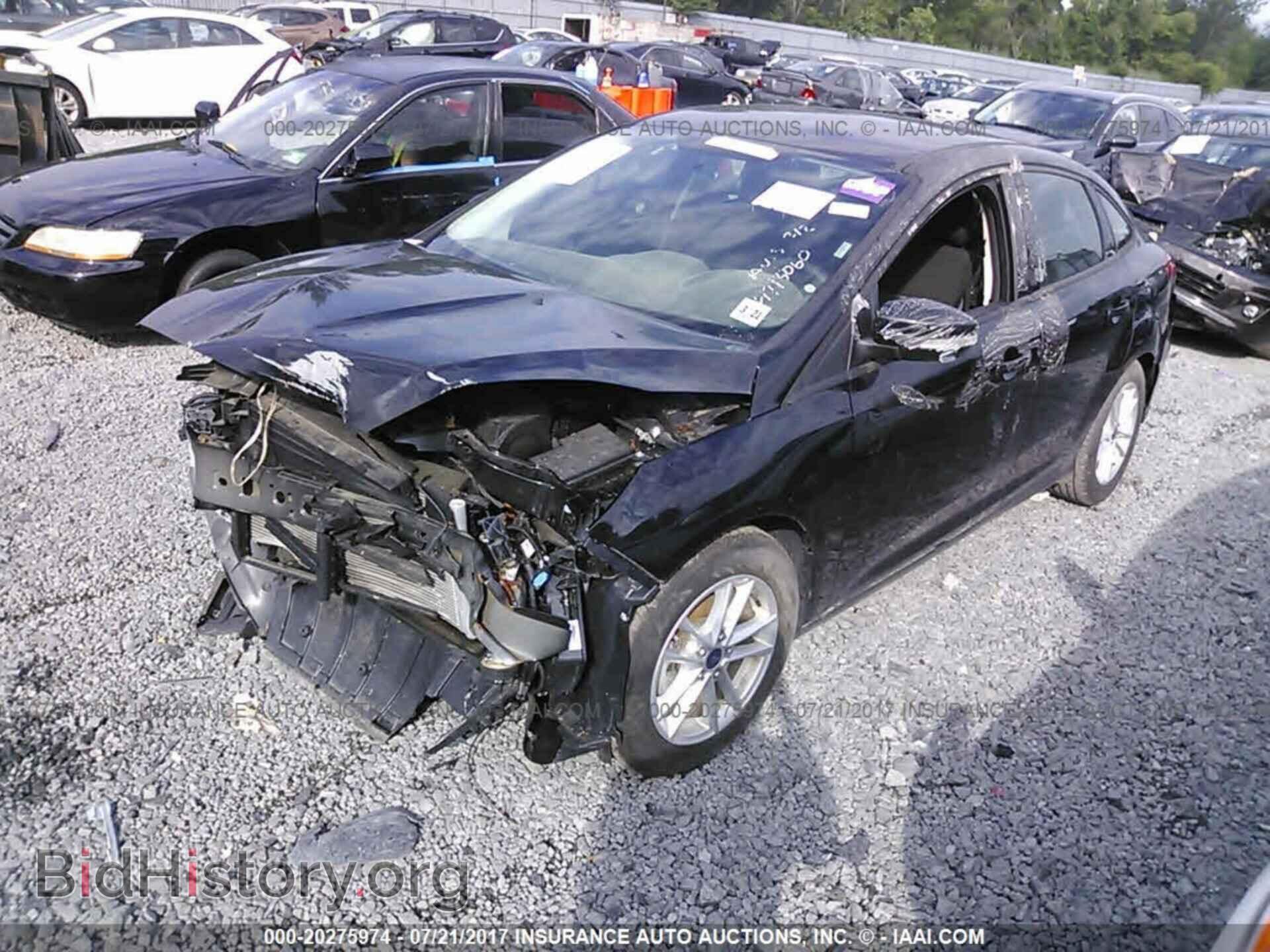 2015 Ford Focus - VIN: 1FADP3F21FL296490 - Photo 2