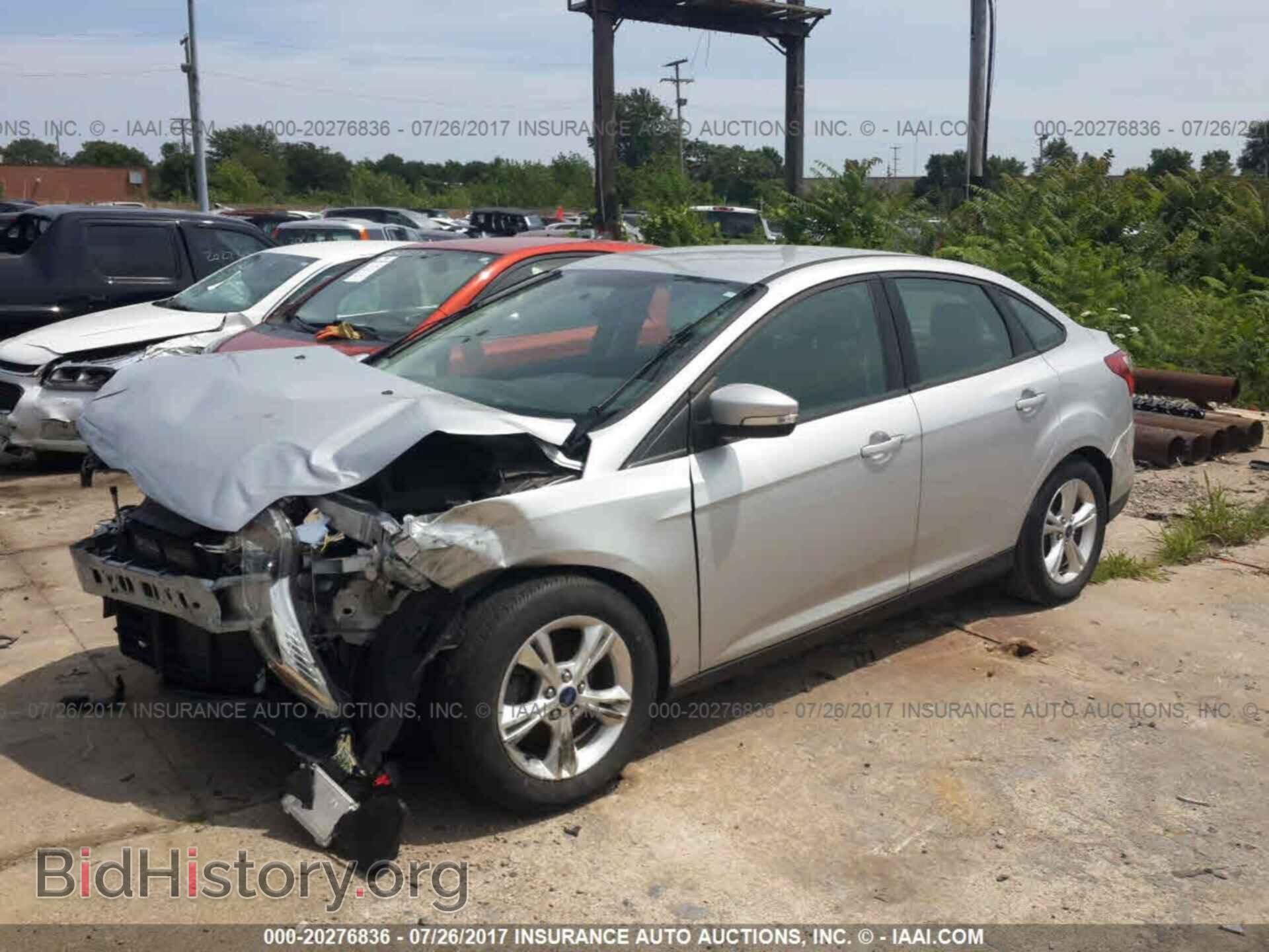 2014 Ford Focus - VIN: 1FADP3F26EL107444 - Фото 2