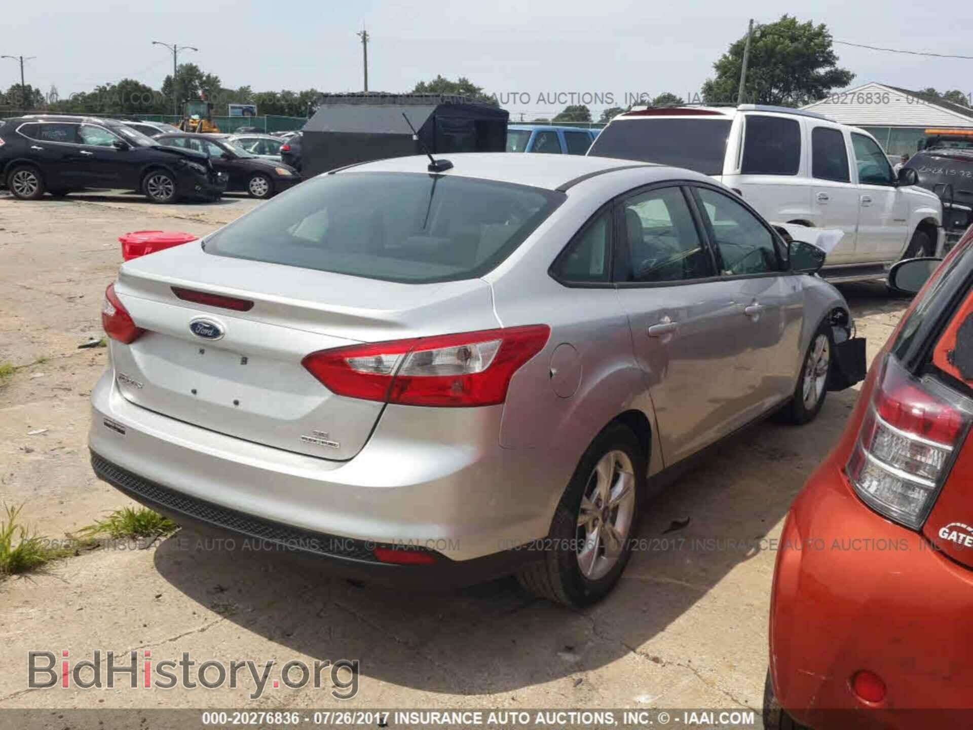 2014 Ford Focus - VIN: 1FADP3F26EL107444 - Фото 4