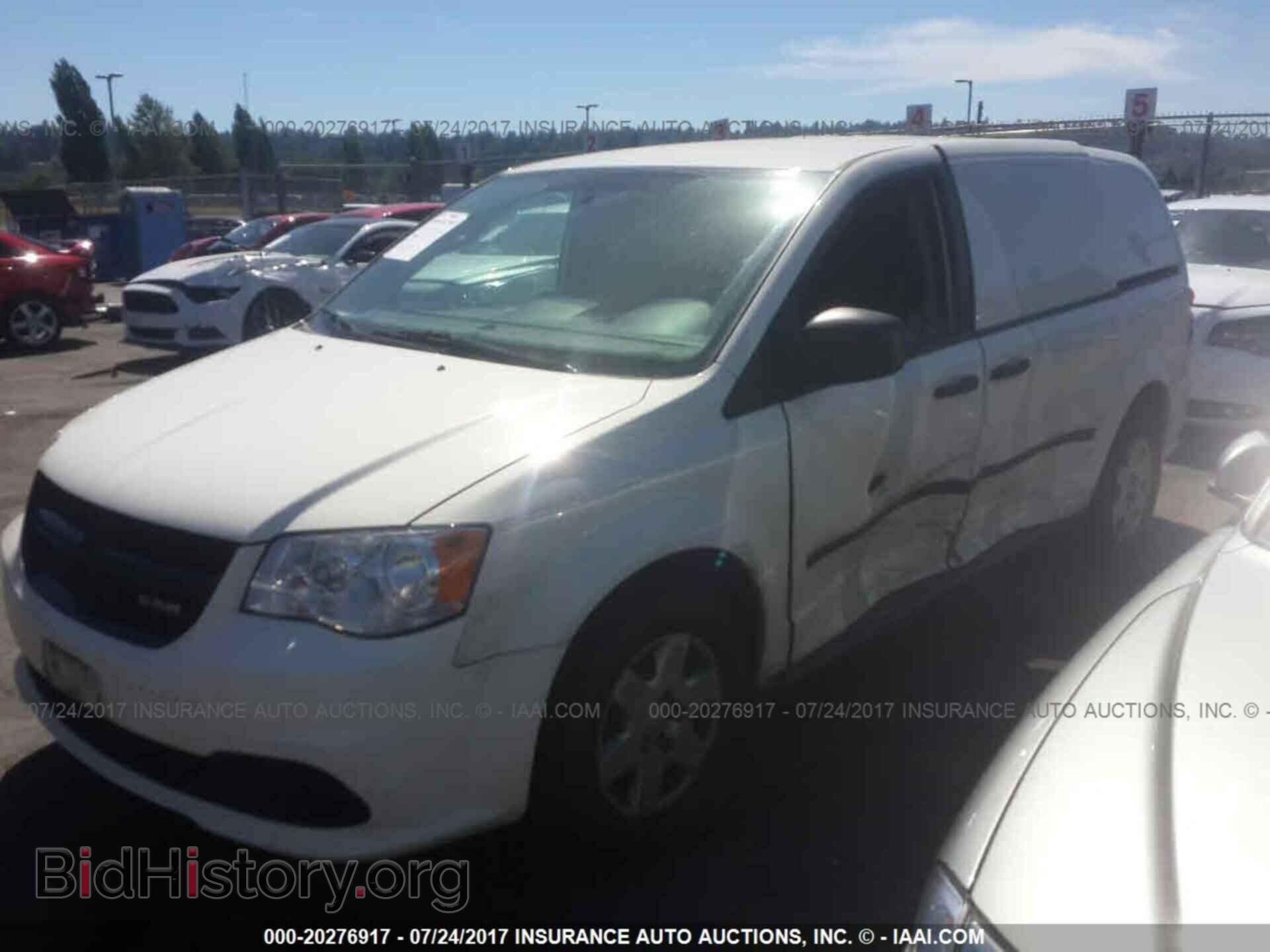 2013 Ram Tradesman - VIN: 2C4JRGAG1DR700457 - Фото 2