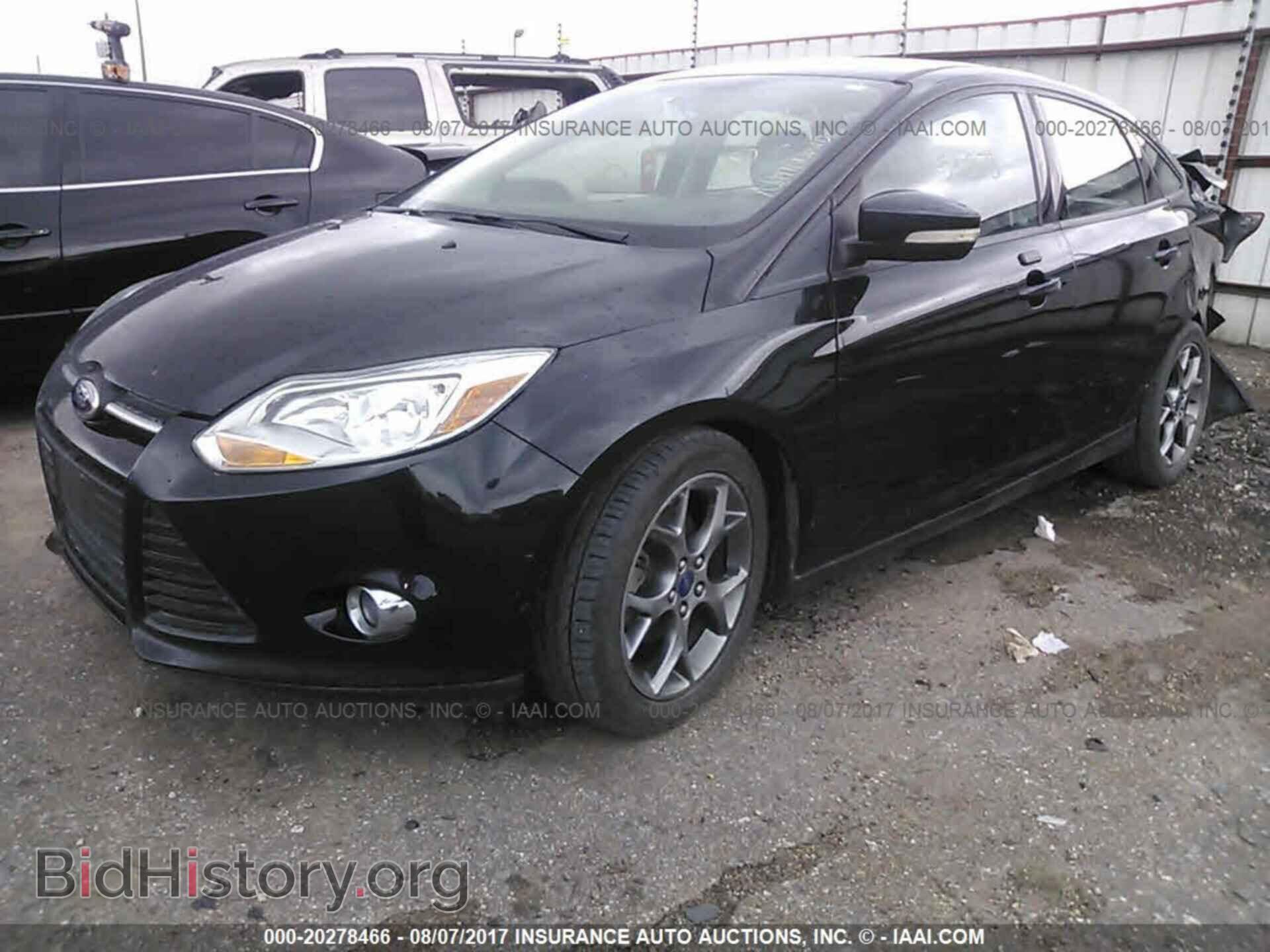 2014 Ford Focus - VIN: 1FADP3F22EL291877 - Фото 2
