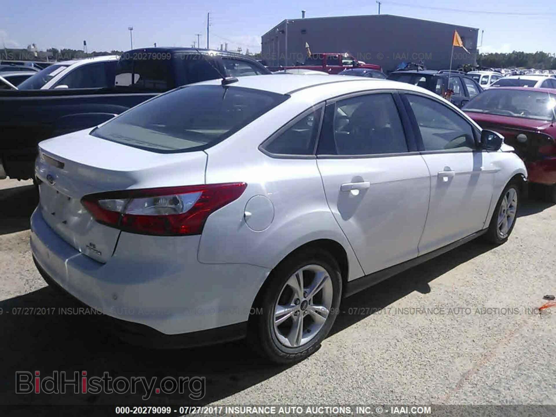 2014 Ford Focus - VIN: 1FADP3F28EL349619 - Photo 4