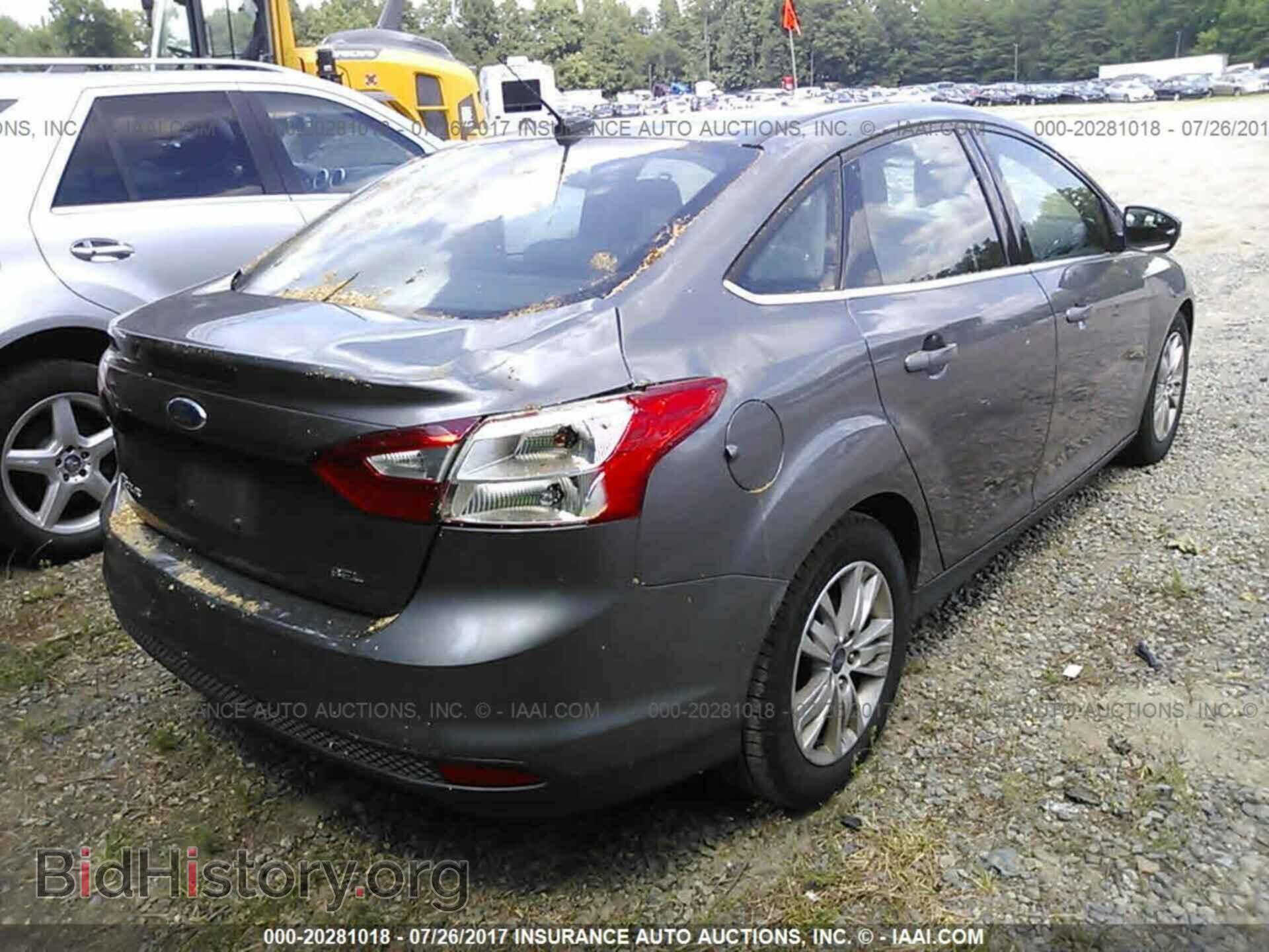 2012 Ford Focus - VIN: 1FAHP3H2XCL176679 - Photo 4