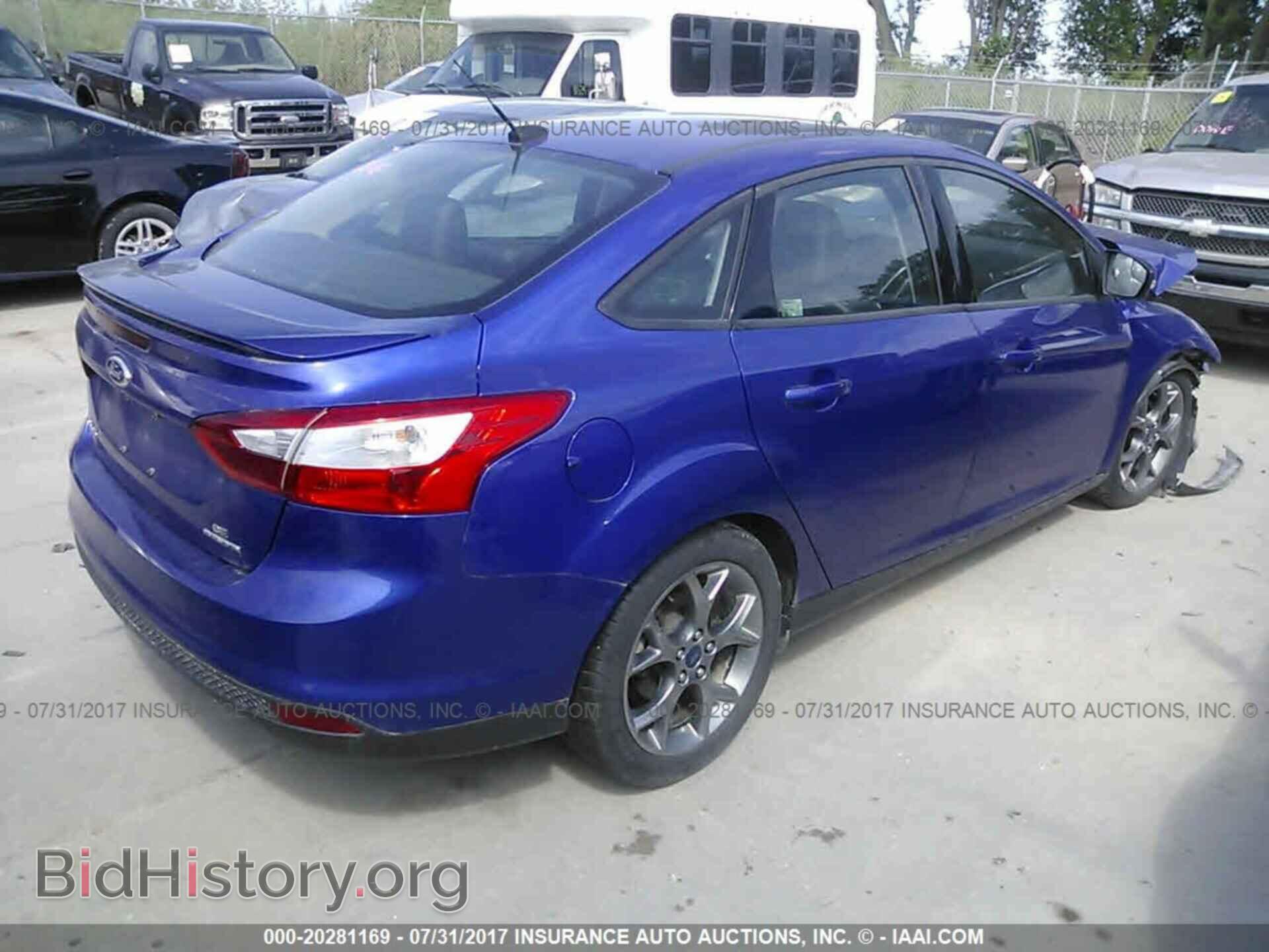 2014 Ford Focus - VIN: 1FADP3F26EL452439 - Photo 4