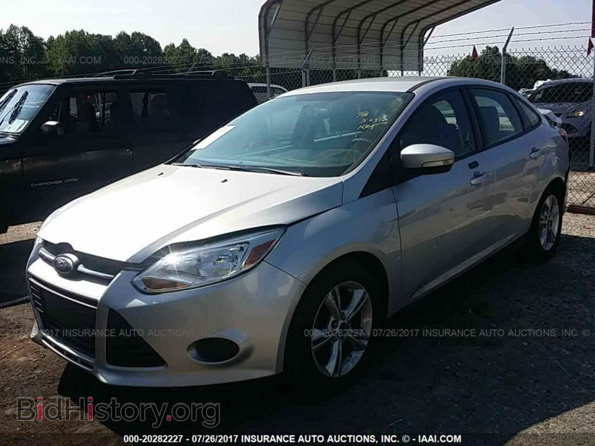 2014 Ford Focus - VIN: 1FADP3F29EL329525 - Photo 2