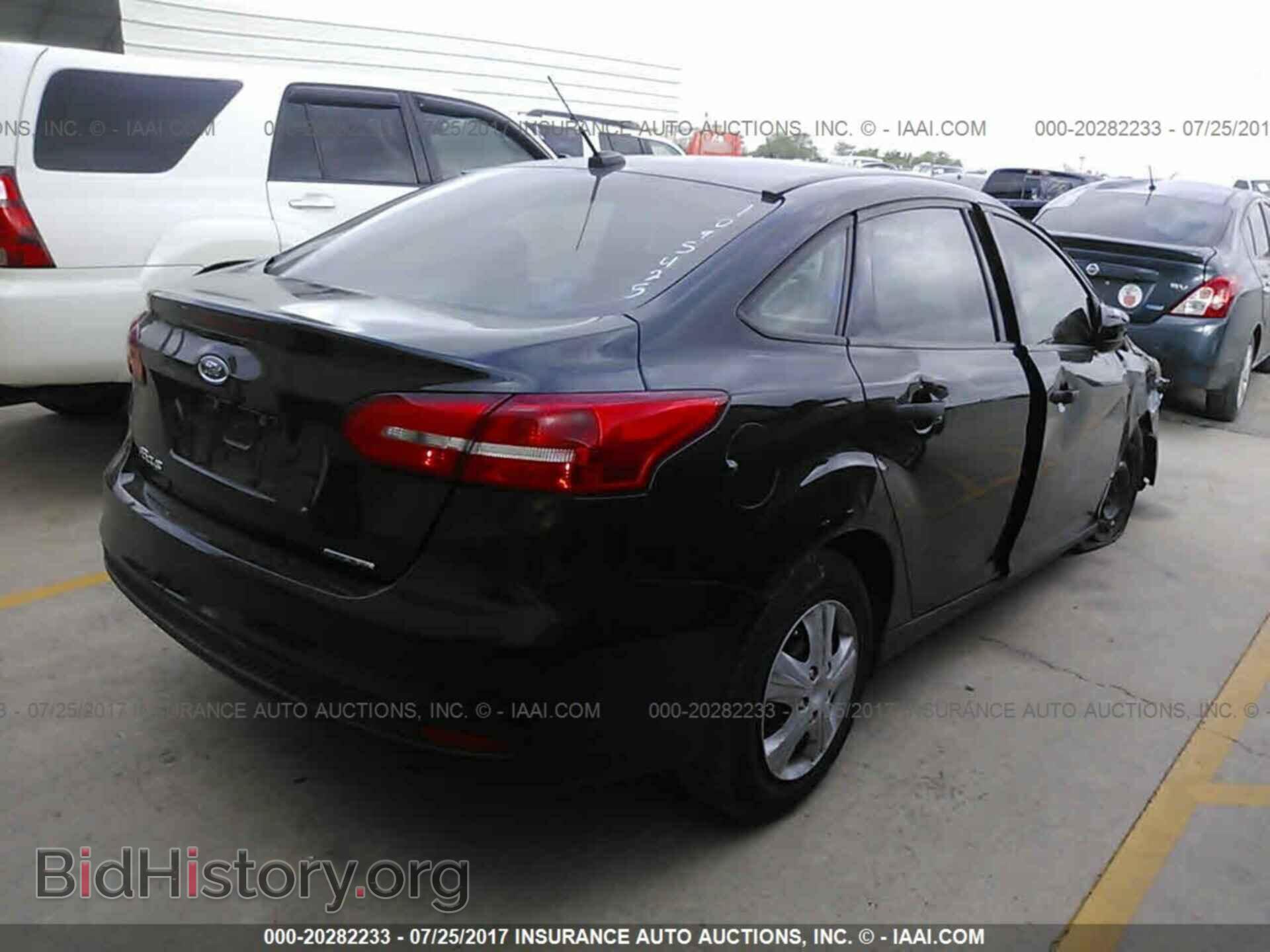 2015 Ford Focus - VIN: 1FADP3E22FL219208 - Photo 4