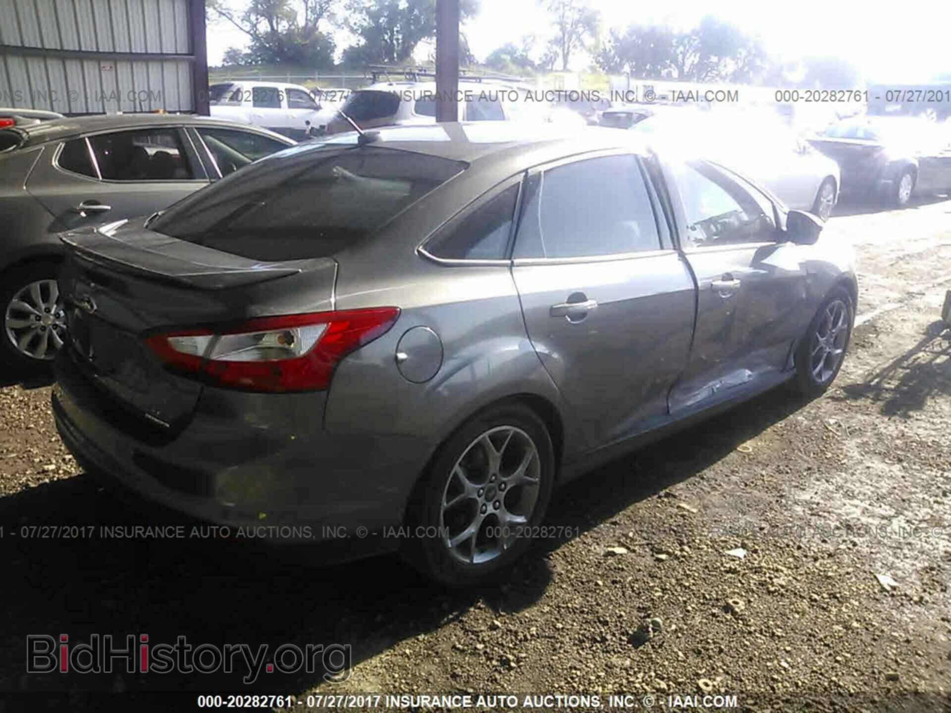 2014 Ford Focus - VIN: 1FADP3F26EL113244 - Фото 4