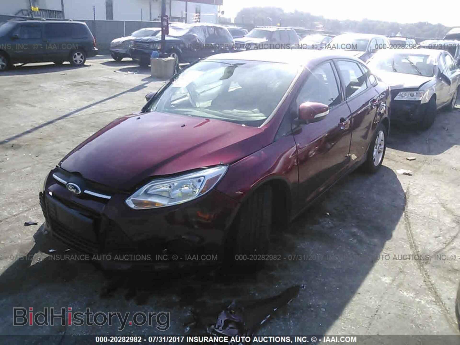 2014 Ford Focus - VIN: 1FADP3F21EL366682 - Photo 2