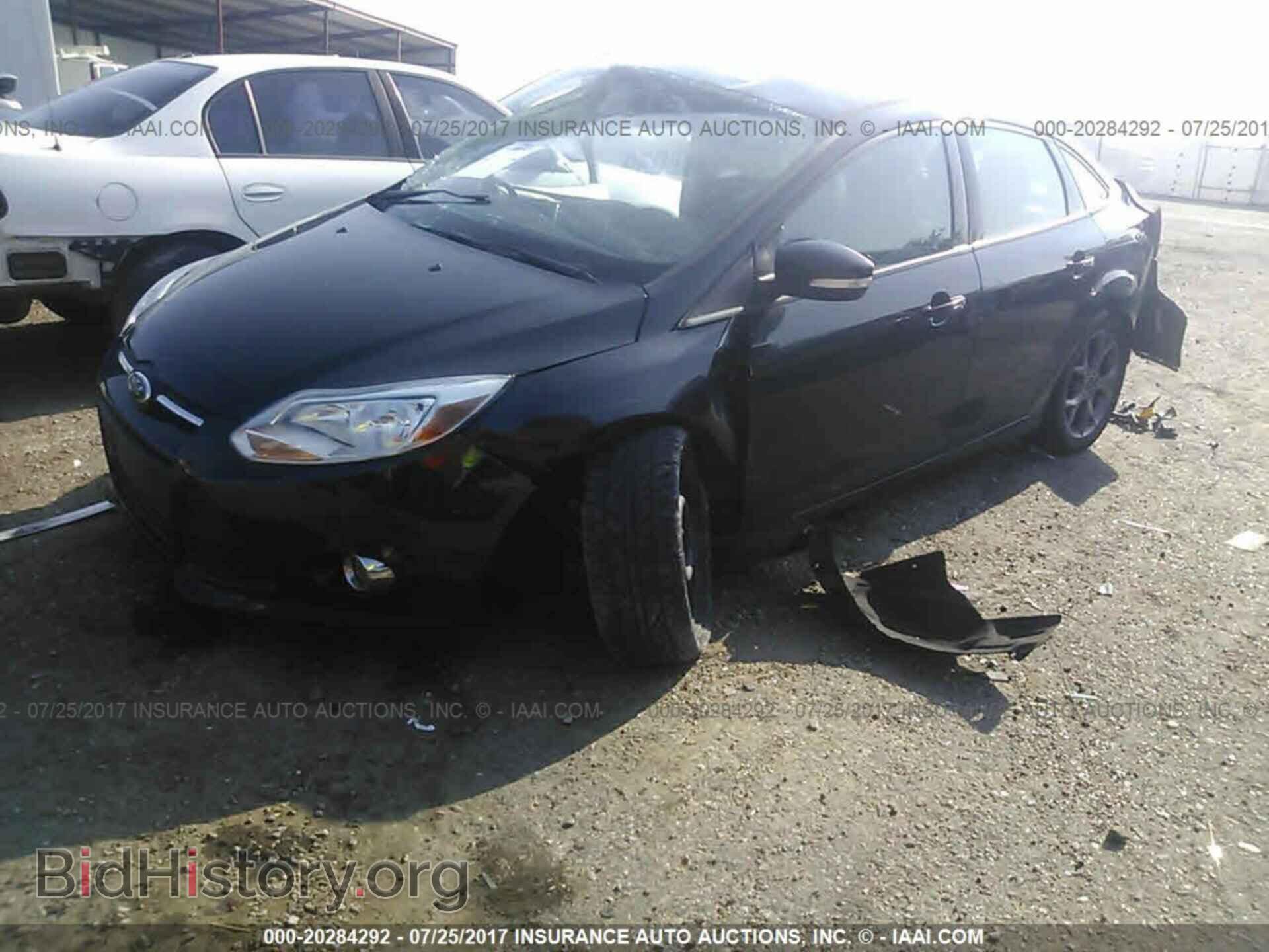 2014 Ford Focus - VIN: 1FADP3F21EL338932 - Photo 2