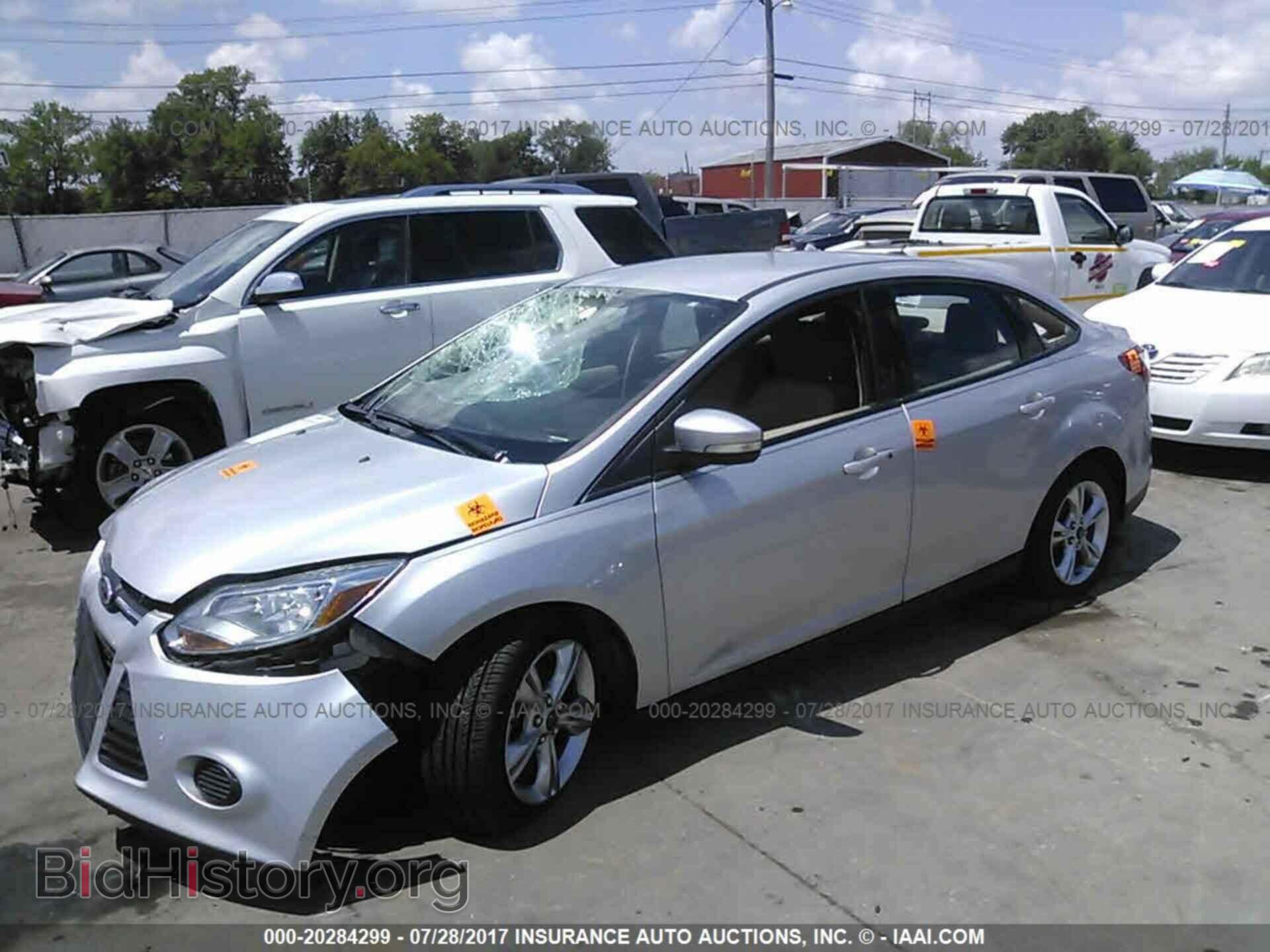 2014 Ford Focus - VIN: 1FADP3F23EL123276 - Фото 2